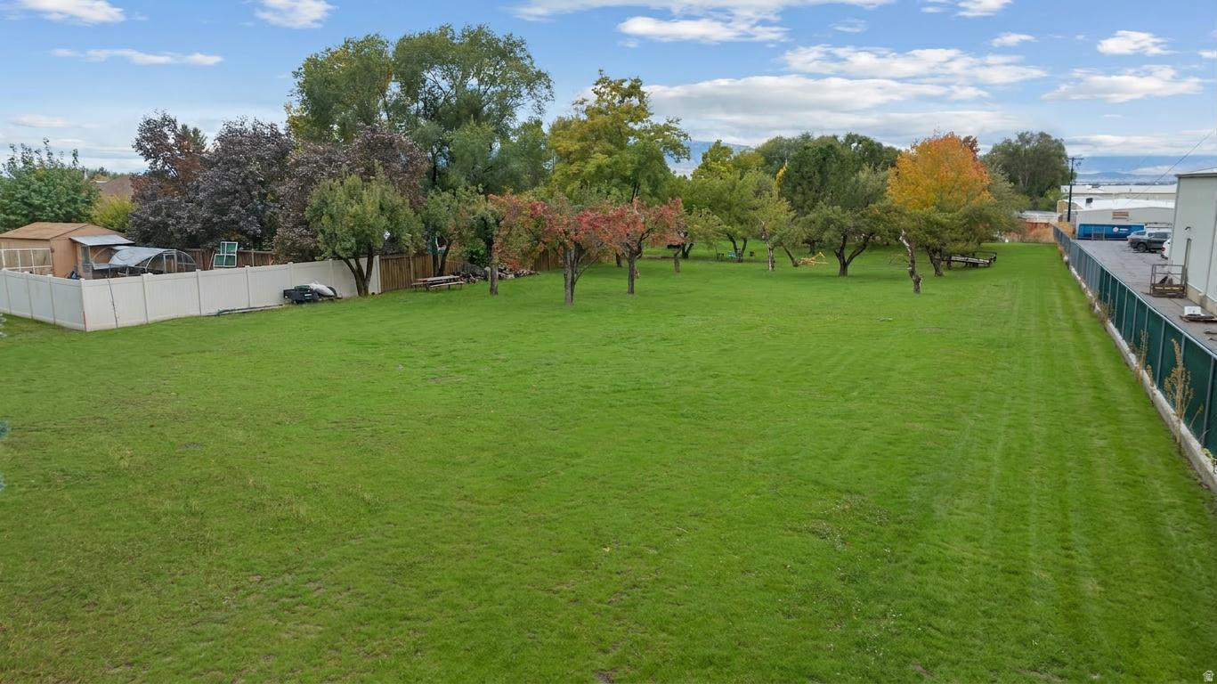This parcel is fully prepped for construction, and all engineering is complete. Site preparation includes PREPAID sidewalk, curb, and gutter and site preparation.  Zoning allows for a single-family home to be built. Option to put a detached ADU that is 40% of the size of the home connected to your utilities. Possible owner financing options available. Come see this .55-acre rectangular lot in the heart of Lindon: 108" wide and 270' deep. Located just 1.4 miles from the Murdock Canal Trail and nearby hiking trails, this lot is ideal for outdoor enthusiasts or those wanting to be near everything. With no HOA this property offers incredible flexibility for custom living or income potential. This property includes animal rights, offering the option of having horse property right in the heart of Lindon. Just minutes from the new Lindon Utah Temple and I-15, shopping, schools, and parks, this is one of the last great building opportunities left in Lindon. It also boasts a mature apple and pear orchard in the back. Bring your own builder and create your dream home today.
