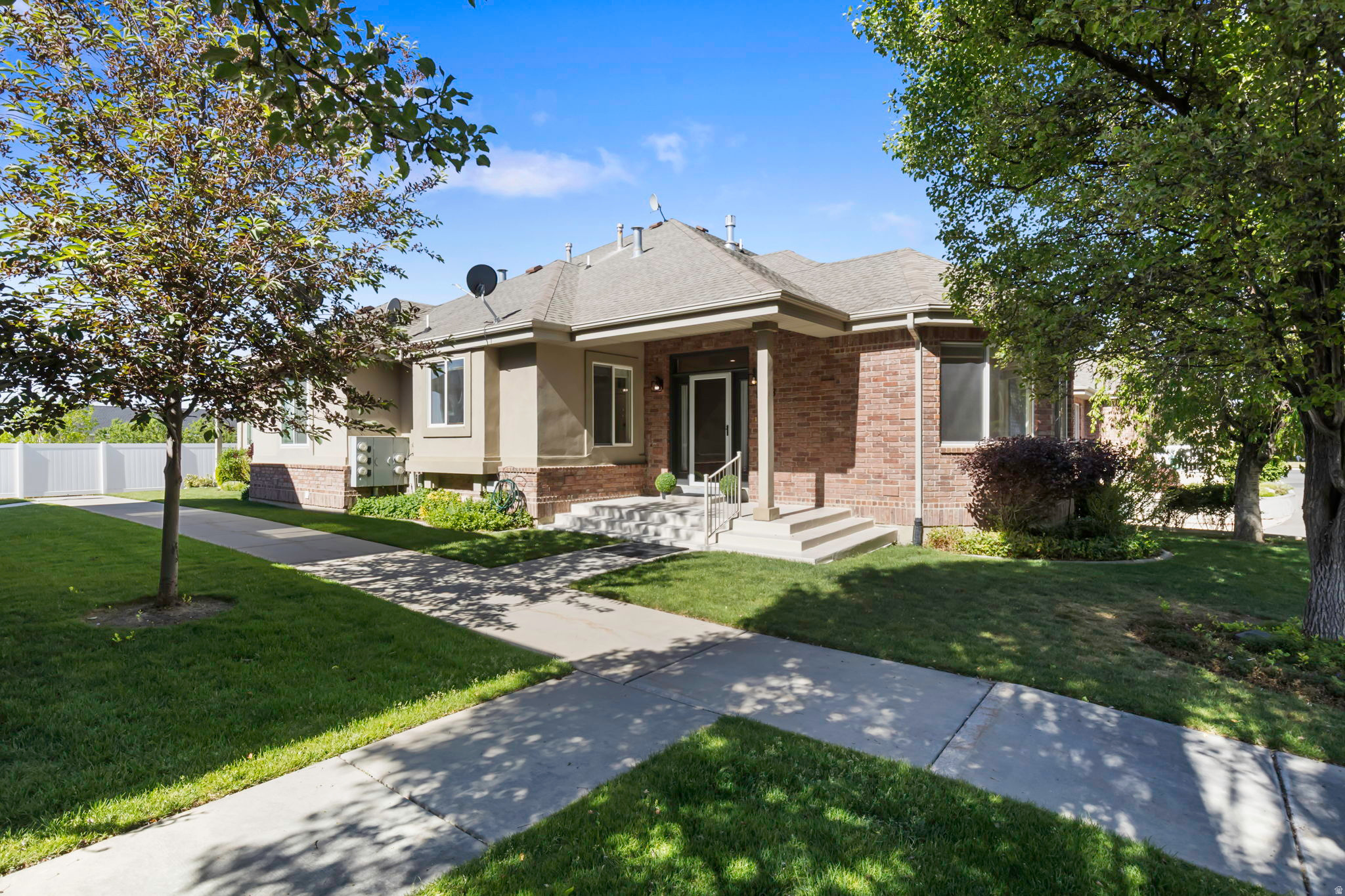 PRICE DROPPED!! NEWLY RENOVATED!! This one won't last! BRAND-NEW CARPET, FRESH PAINT top to bottom, ALL-NEW LIGHT FIXTURES, and NEW HARDWARE on every door, cabinet, and drawer throughout the entire home. This isn't a "well-maintained" home, it's been GENUINELY TRANSFORMED. Open-concept layout with 2 BED/2 BATH, owner's suite with WALK-IN CLOSET, separate tub/shower, UPDATED FIREPLACE, NEW A/C & FURNACE. 2-CAR GARAGE + bonus room downstairs with wardrobes and shelving, PLUS a very large fully shelved storage room. Steps to Harvey Park (pickleball, tennis, playground) and minutes to American Fork Canyon, top-rated schools, shopping & freeway. Owner-occupancy required first 2 years. Sq ft is courtesy estimate; buyer to verify.