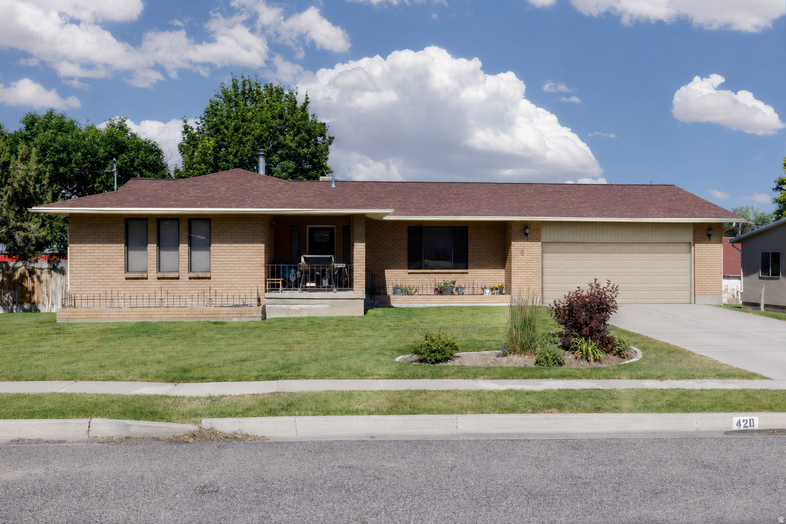 Great Ephraim location near schools and local amenities! This brick home sits on a 0.40-acre lot and offers 3 bedrooms, 2.5 bathrooms, a 2-car garage, and over 3,600 total square feet with a full basement. Features include main-level living, fireplace, mature trees, fruit trees, full landscaping, automatic sprinklers, mountain views, and a more private yard feel. A solid home with great space, a huge lot, and room to make it your own. Buyer to verify all information.