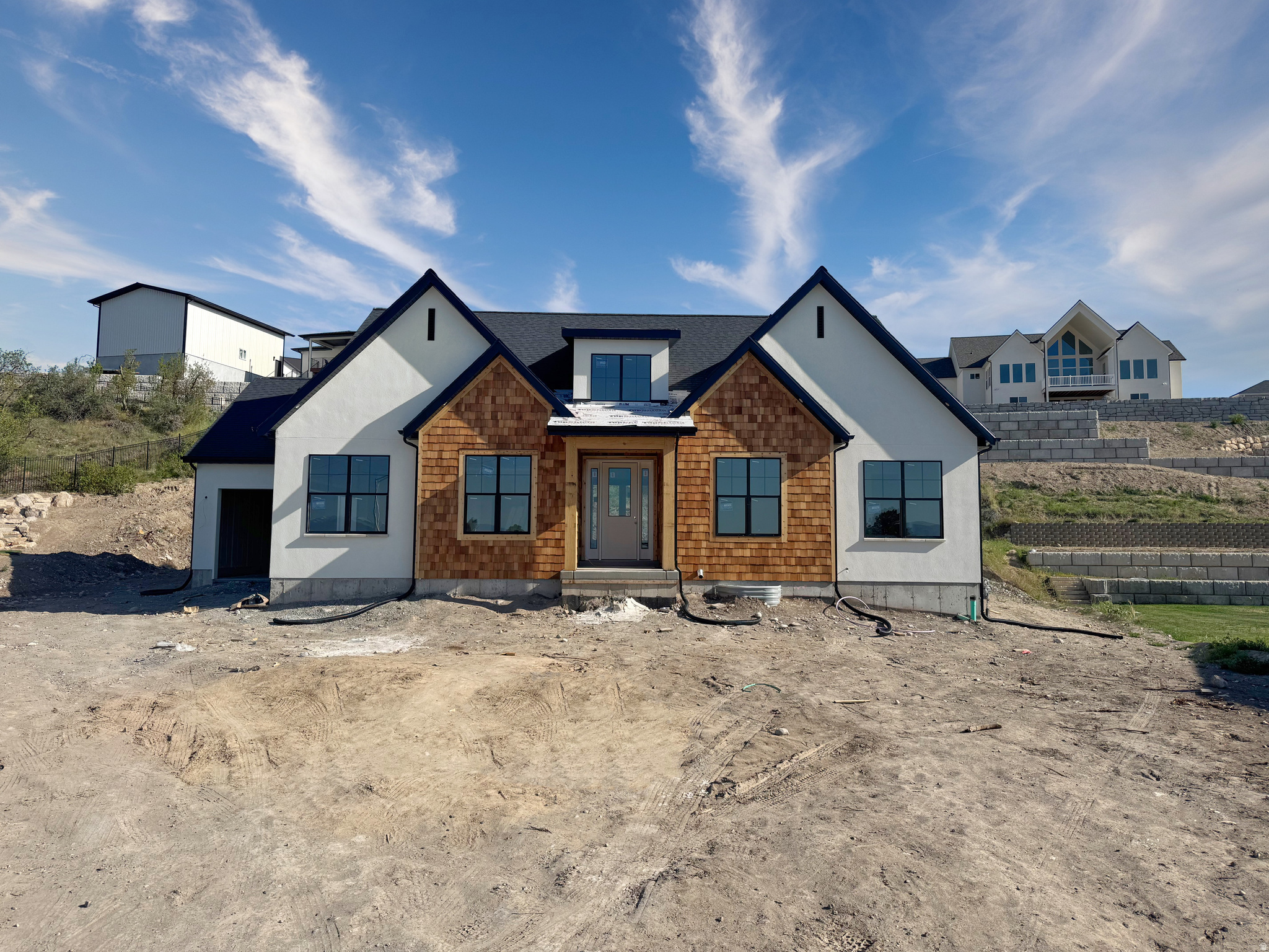 ** OPEN HOUSE SATURDAY JUNE 13TH 3PM-5PM! COME CHECK IN AT 1872 S 100 E Payson FIRST** 3.99% 5 year ARM, or 4.99% Fixed interest rate, or $20,000 toward closing costs when using our preferred lender! (terms and restrictions apply).  Final opportunity in Payson View Estates! This stunning 5,429 SF Elizabeth sits on a .53 acre lot and  is the last available home in the subdivision. Offering high-end finishes, main level primary suite, massive garage, future ADU potential, and an unbeatable location in a quiet cul-de-sac at the base of Payson Canyon. The home features 4 bedrooms, 3.5 bathrooms, vaulted ceilings, and beautifully custom-designed cabinetry and bathrooms throughout. The oversized deep 3rd car garage provides excellent space for larger vehicles, and storage.  With a partially finished basement that includes 2 bedrooms and a full bathroom, while the remaining unfinished space is thoughtfully laid out with the potential to create a separate 2-bedroom ADU.  This home is scheduled to be complete mid June 2026. Hurry before it's gone! PLEASE BE CAREFUL WHEN VIEWING, HOME IS UNDER CONSTRUCTION.