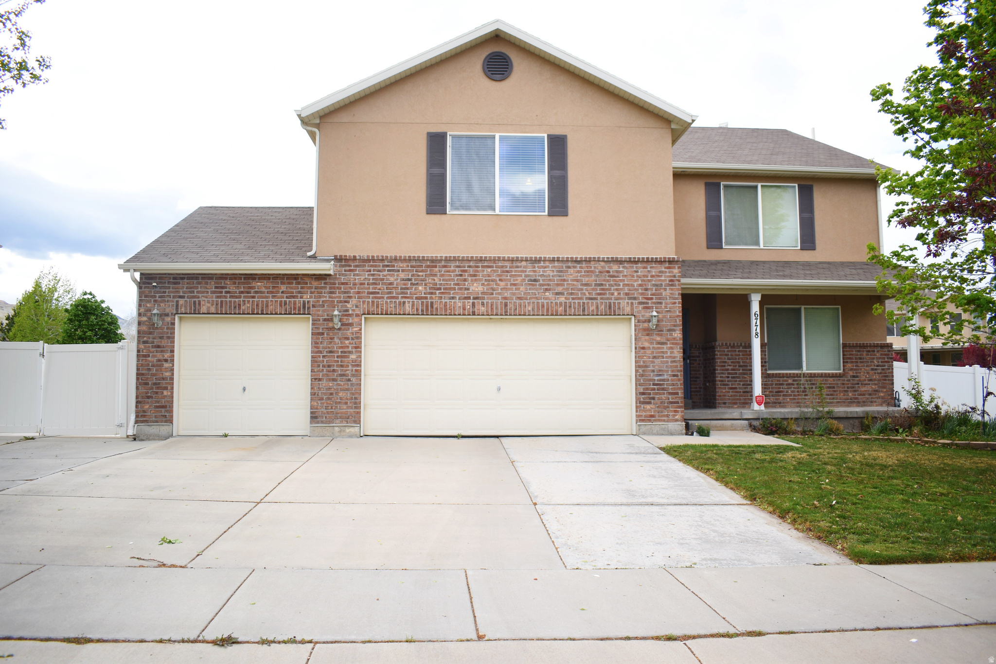 $35k price drop!! Welcome to your new home! This home features a remodeled primary bathroom with beautiful marble and porcelain tile. All the carpet upstairs was replaced in 2024 and a new A/C unit was also installed in 2024. The quartz Countertop was also added in the kitchen in 2023. Don't miss out on this amazing opportunity to make income off the mother-in-law apartment! With the separate entrance and second kitchen and laundry hookup it will be a great rental! Make an appointment today!