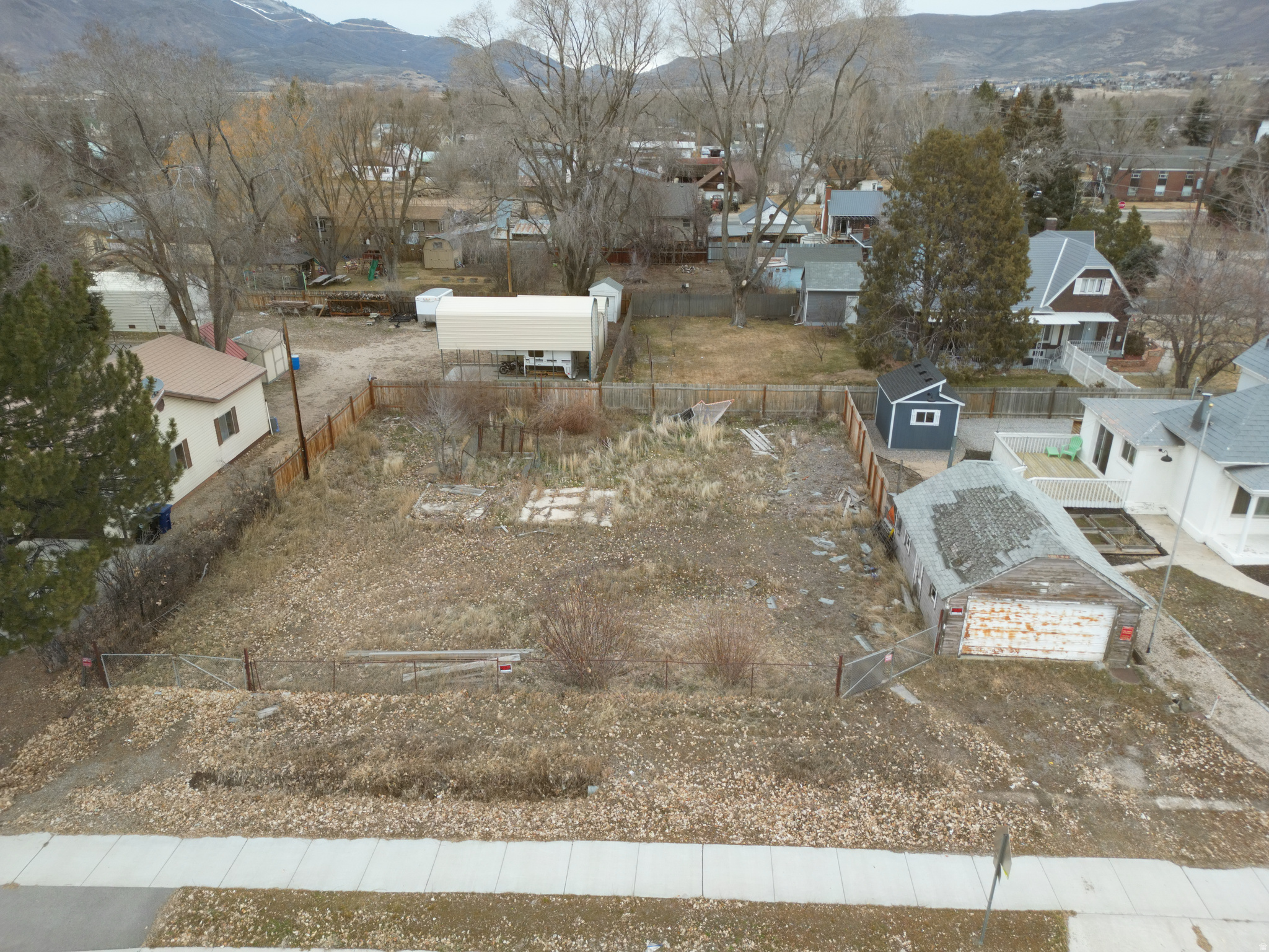 A rare chance to build in the heart of Heber City one of the last buildable lots in this highly desirable area. This unique property features an existing shed that can be reimagined into a garage with living quarters, along with the opportunity to build a home that may function as a non-conforming ADU, offering outstanding rental or investment potential. Properties like this almost never come available.