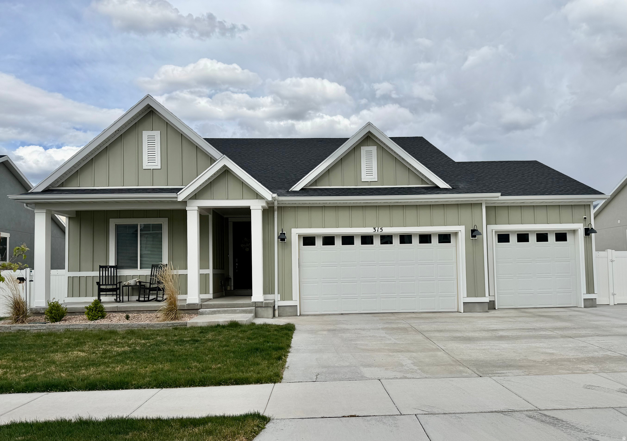 This beautifully upgraded 2022 home offers over 3,400 sq ft of modern living in one of Mapleton's most desirable neighborhoods. The open-concept main floor features a chef's kitchen with quartz counters, stainless appliances, and classic white cabinetry, plus a luxurious primary suite with soaking tub, separate shower, and walk-in closet. The fully finished basement includes its own kitchen and laundry-ideal for guests or rental income. Enjoy a 3-car garage with Tesla charging, RV parking, energy-efficient systems, and a fully landscaped backyard with patio. Community pool access via HOA. Quiet setting with mountain views. Close to shopping, freeway, and medical services.