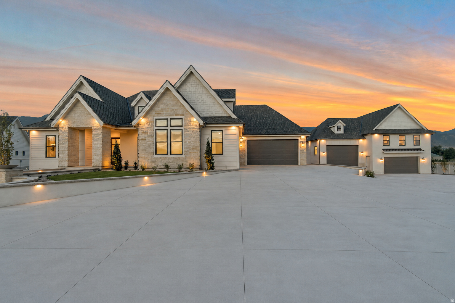 Built with the level of craftsmanship, engineering, and attention to detail that only a custom home builder with more than 30 years of experience could build for himself, this exceptional residence was designed without compromise. Every finish was intentionally selected, every space thoughtfully planned, and every detail carefully executed to create a home that blends timeless design with outstanding functionality.  The chef's kitchen is appointed with Wolf and Sub-Zero appliances, ceiling-height custom cabinetry, and a fully equipped butler's pantry with a full-size refrigerator. A second full kitchen provides exceptional flexibility for entertaining, extended family, or multi-generational living.  The primary suite offers a private retreat with a sitting area, fireplace, spa-inspired bath, and an exceptional custom closet featuring floor-to-ceiling cabinetry and its own laundry.  Luxury fixtures and finishes continue throughout, complemented by soaring ceilings, oversized doors, a dedicated fitness room, and a floor plan where every square foot was intentionally designed to maximize both function and livability.  The detached garage includes a beautifully finished two-bedroom accessory dwelling unit, while garage space for up to 12 vehicles provides ample room for a vehicle collection, RVs, boats, recreational equipment, workshop space, and abundant storage.  The backyard has already been thoughtfully prepared, with utility stub-outs in place for a future swimming pool and an in-ground fire pit, allowing the next owner to create an outdoor living space that matches the caliber of the home.  Properties of this caliber are seldom available. There is simply nothing else like it along the Wasatch Front.