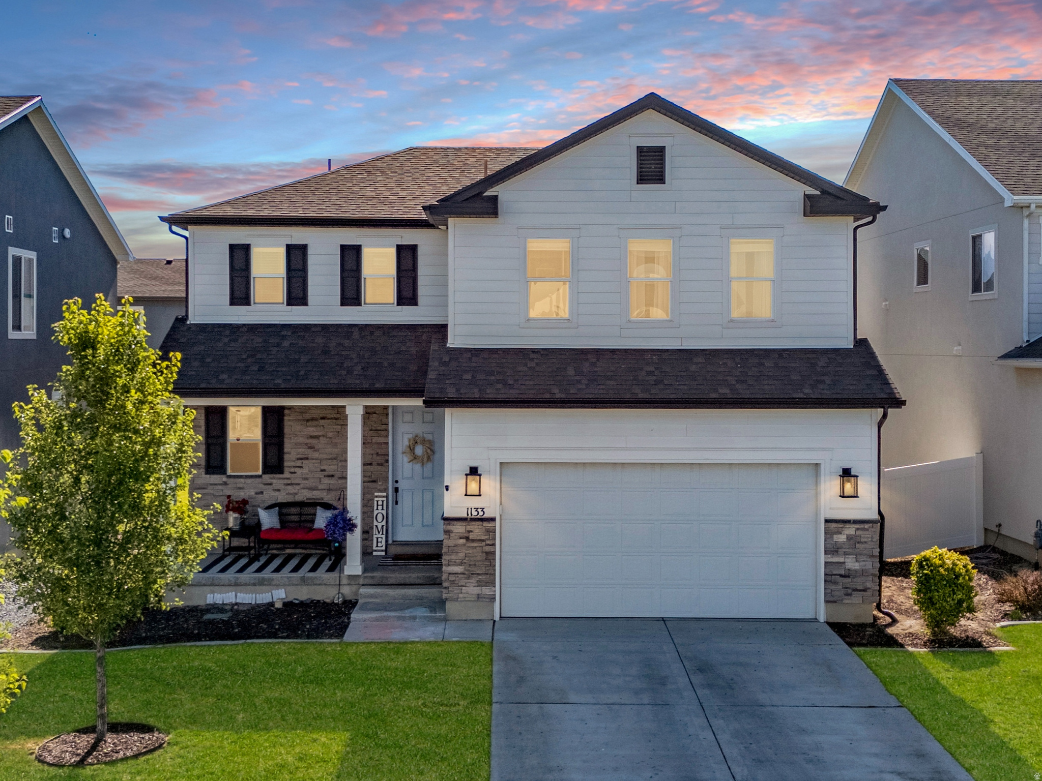 Enjoy the best of West Point living with nearby parks, top-rated schools, youth sports facilities, shopping, dining, and convenient access to FrontRunner. Experience the small-town charm, community events, and peaceful setting that make West Point one of Davis County's most desirable places to call home.  Why wait for new construction when you can own this like-new home complete with professional landscaping, fencing, and move-in-ready convenience? Step inside and discover an incredible open-concept floor plan filled with natural light and designed for both everyday living and entertaining. The bright, modern kitchen features quartz countertops, an oversized island, gas range, vented hood, and ample cabinet space.  Upstairs, retreat to the spacious primary suite featuring a private ensuite bathroom with dual vanities and a large walk-in shower. Two additional bedrooms and a full bathroom provide plenty of room for family, guests, or a home office.  Outside, enjoy your fully fenced backyard with plenty of space for relaxing, entertaining, pets, or play. And when you need even more room to roam, a nearby neighborhood park is just moments away. This turnkey home offers the perfect combination of comfort, style, and location.