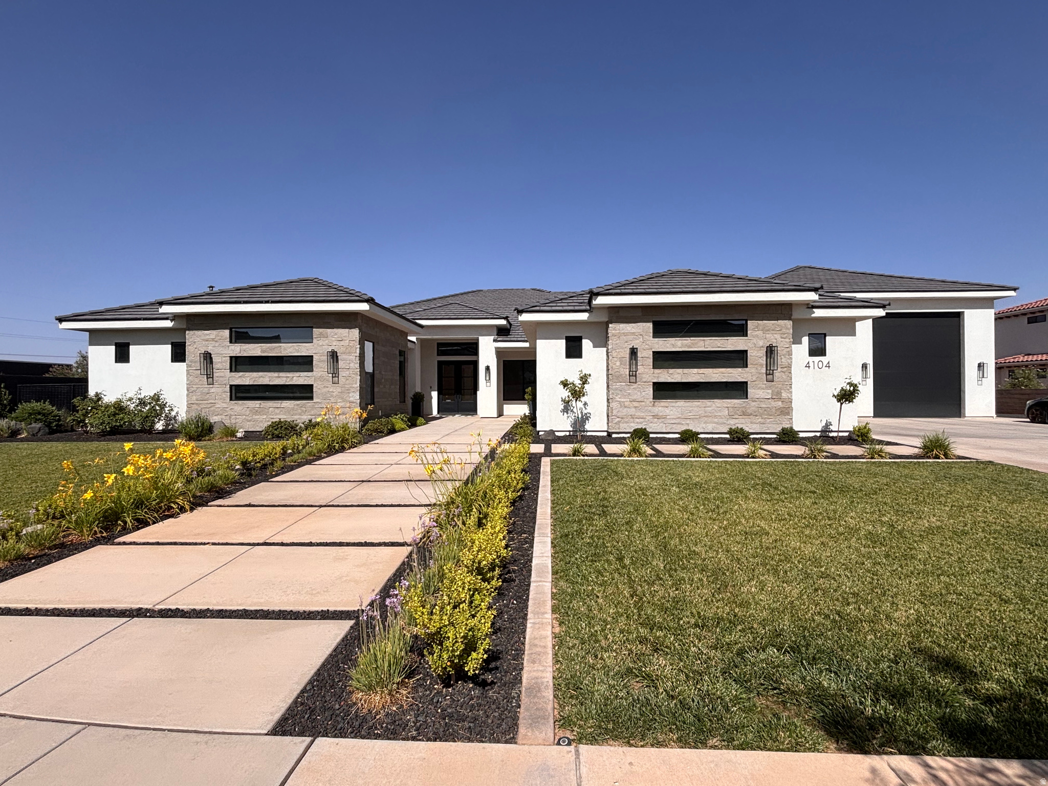 Hard to find 3900sf rambler on large .84 acre lot in highly desirable Meadow Valley Farms. Open floorplan with plenty of room to spread out and entertain, especially when you open the 4 panel 12' wide glass doors to spill out onto the covered patio. Dual dishwashers, Thermador 6 burner + griddle rangetop, built in oven + convection microwave makes food prep and cleanup an easy and enjoyable task. DOUBLE RV BAYS, each measuring 16'x50' & 14' doors, water, 50 amp 240v power & sewer clean out inside the RV bay. Garage Aficionados will appreciate the 4 240v outlets, reinforced pad for a car lift, high bay lights and warehouse style storage racks. Backyard is an open slate, with power, water & plumbing already in place for a pool on one side and a pool house on the other side. Owner/Agent All bedrooms have their own attached, private bathrooms and a walk in closet. 2x6 construction with radiant barrier roof sheathing and 16 SEER HVAC keeps the home comfortable and doesn't break the bank while doing it. Tons of storage space throughout the home, especially in the pantry and kitchen cabinets. Cabinet drawers are made with dovetail joinery and upgraded soft close hardware. Rift sawn white oak and painted maple wood faces were used for their durability and timeless look. All lighting is LED and all can lights have adjustable color temperature which changes the tone of the lighting if desired. Wood floors are 9/16" engineering French Oak with 4mm veneer, meant for extreme durability and potential for refinish if ever needed. Engineered plans for pool house with full bathroom can be included, if desired. All rooms have CAT6 cabling run to them in addition to 2 ceiling mounted wifi routers. Office has 2 floor mounted outlets with ethernet ports to eliminate the need for extension cords.