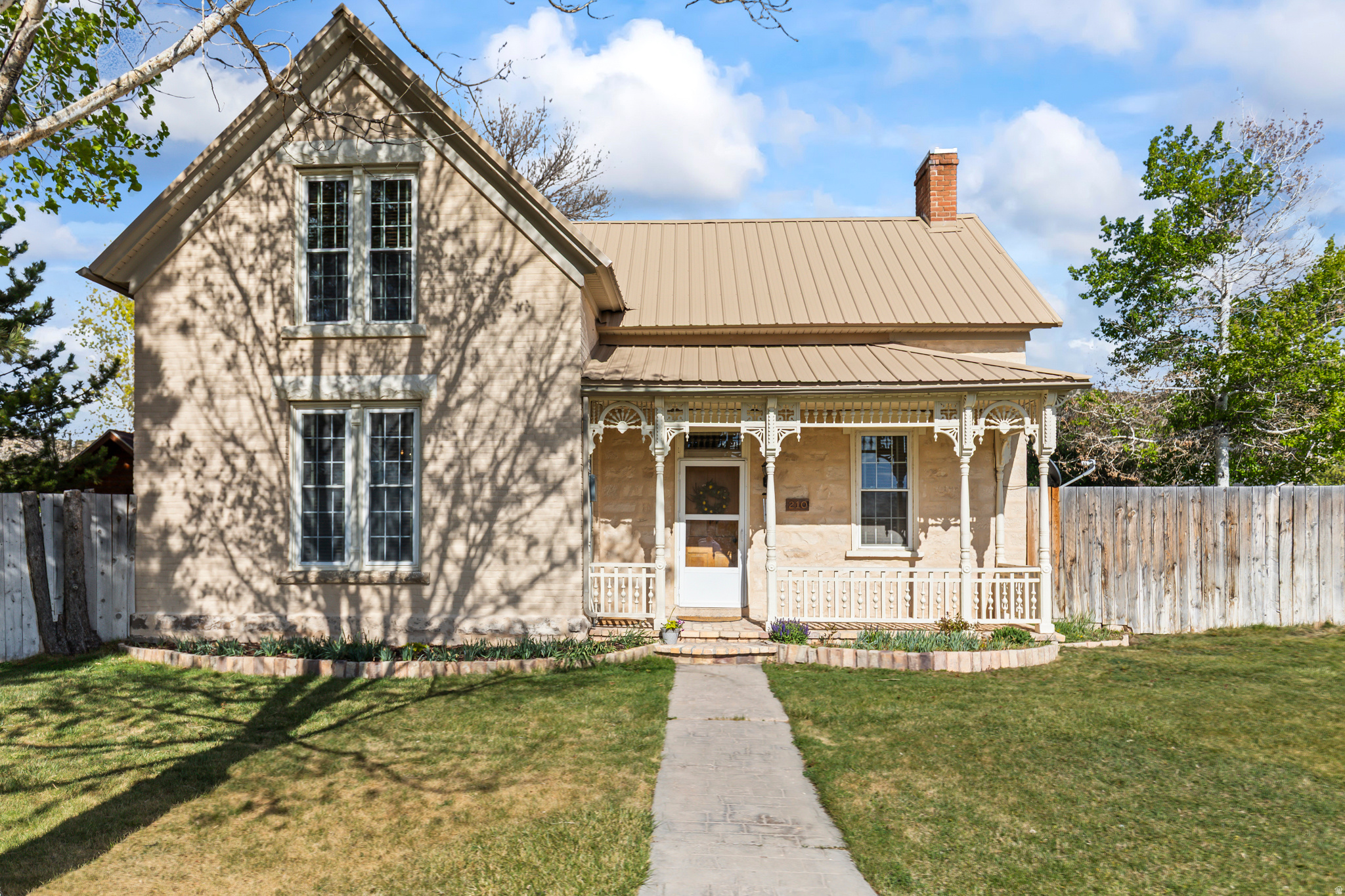 Charming country home blocks from the Manti Temple.  ADU contains an additional 600 +/- finished sq. ft. bringing the price per sq. ft to $218. Approx. 5 minutes to Manti Canyon. ATV/UTVs allowed on city streets. Ride from your home to the canyon. Access the Arapeen Trail system with 600 miles of trails, including the skyline drive between Highway 6 to the north and I-70 to the south. 11 min. to Palisade State Park with swimming, paddling and golf. 10 minutes to Snow College. Beautiful mountain bike trails up Ephraim Canyon. Whether you love the outdoors, a winter night by the fire, growing vegetables in the greenhouse or relaxing in the sauna, this property has it. Cellar, wood shed, grape vines. $40k new metal roof with all new OSB underneath recently installed. Taxes and sq. ft. from public sources. All information to be verified by buyer.