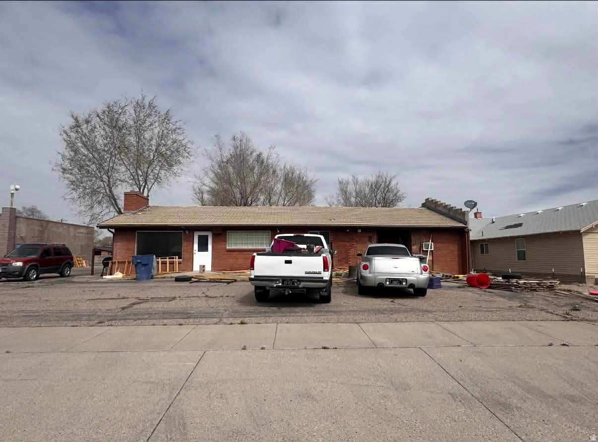 Unique opportunity to own a Main Street property with incredible potential! Previously operated as a restaurant with a catering kitchen, this versatile building offers three separate entrances, making it ideal for multiple uses. The layout includes office space with a reception area and two private offices, perfect for a medical office, professional business, or home-based enterprise. With its flexible design, the property could also be renovated into multi-family housing or a live-work space. The possibilities here are truly endless! **More photos will be posted soon**