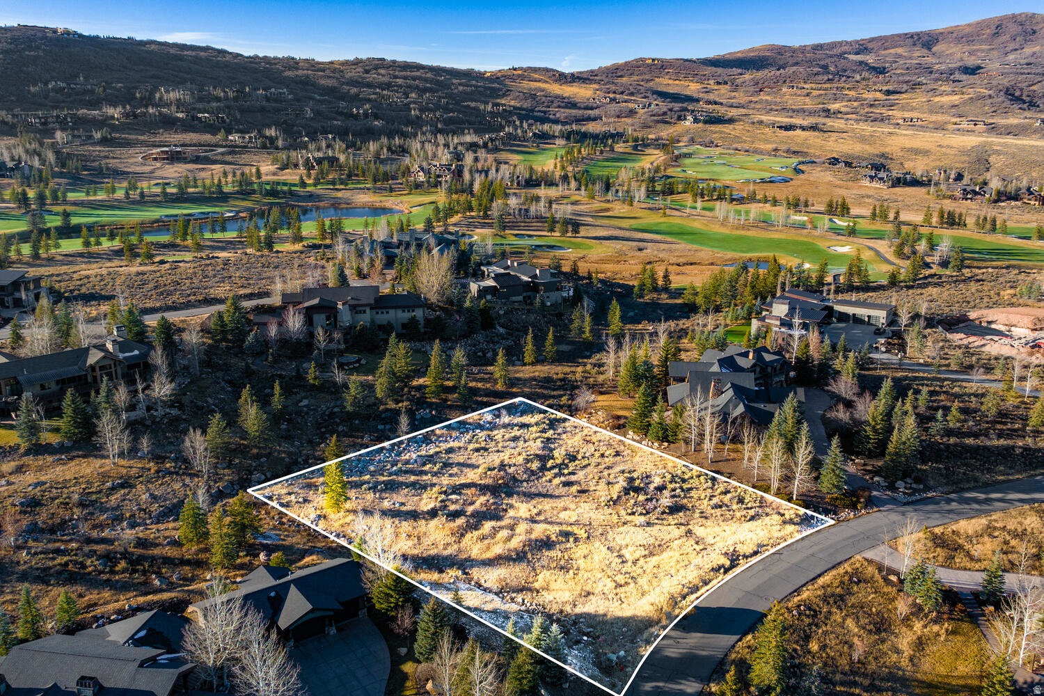 Presenting an incredible opportunity to build on a desirable flat homesite that is ideally located within the gated community of Glenwild. Features include golf course and Uinta mountain vistas, perennial stream boarding two sides of the property, a private pond, adjacent open space and quiet cul-de-sac setting. Glenwild's Tom Fazio-designed championship golf course has been ranked Utah's number one course consecutively since 2005. The private golf community located in the Park City School District offers convenient access to I-80 for a quick commute to the Salt Lake International airport and is within 20 minutes of Park City's three ski resort bases.