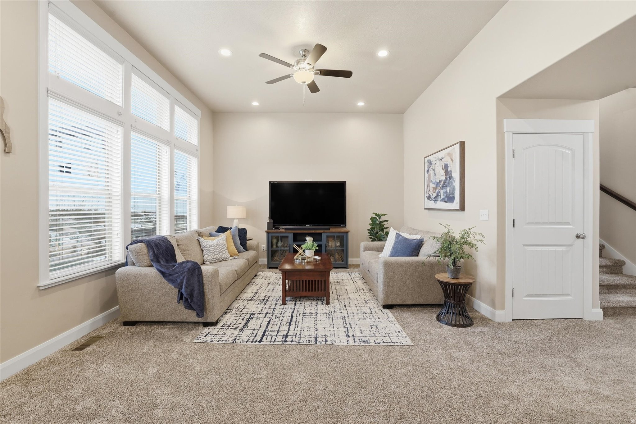 Spacious and bright open-concept 2-story home with 6 bedrooms, 3.5 baths, and 3,169 sq. ft. on a .28-acre lot. Built in 2015, this home offers a fully finished basement, attached 2-car garage with extra vertical storage, RV parking and brand-new carpet throughout! The beautifully landscaped yard features automated sprinklers, a fenced backyard, and fruit trees, including peach, pear, and apple trees. Enjoy stunning mountain and valley views, along with gorgeous sunsets from the front porch. Easy to show. Call agent for details.