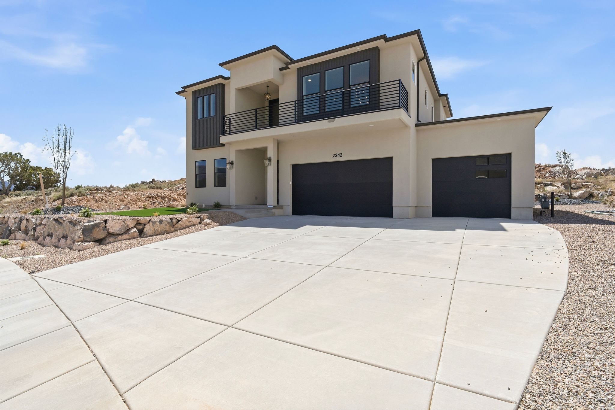 **$10,000 toward buyer closing costs/concessions** Experience luxury and modern living in this stunning, modern two-story home located in the beautiful Talon Pointe at South Mountain development. Oasis is not just a home; it's a sanctuary where comfort meets modern elegance, surrounded by breathtaking mountain views. 3 car garage fully finished with workshop area, 4 Beds, 3 Baths, and main level office that can be converted to a 5th bedroom. 10' ceilings on main, 9' ceilings on 2nd floor. Luxurious primary suite/ensuite features private covered patio, walk-in closet, tile flooring with oversized rain shower, soaking tub, dual vanity, makeup desk and all granite or quartz surfaces. Large Laundry Room, custom cabinetry and sewing/crafting desk. Gourmet Kitchen equipped with stainless 36" gas range, refrigerator, disposal and dishwasher. Large Windows provide natural light and contribute to a spacious open feeling. Oversized Island. Granite Surfaces and tile backsplash. Walk-In Butler Pantry. Adjoining Dining Area and Great Room is ideal for entertaining and family gatherings or just relaxing. The fully landscaped yard includes a sprinkler/drip system, artificial turf, desert friendly plants and xeriscaping for low-maintenance. Two units and zoned HVAC systems keeps Oasis comfortable year-round. 240v/50 amp outlet in garage provides access for EV charging, RV plug-in or specialty tools. Solar-Ready Electrical Panel. See virtual tour for more! Square footage figures are provided as a courtesy estimate only and were obtained from architectural plans. Buyer is advised to obtain an independent measurements and verify property taxes with Iron County.