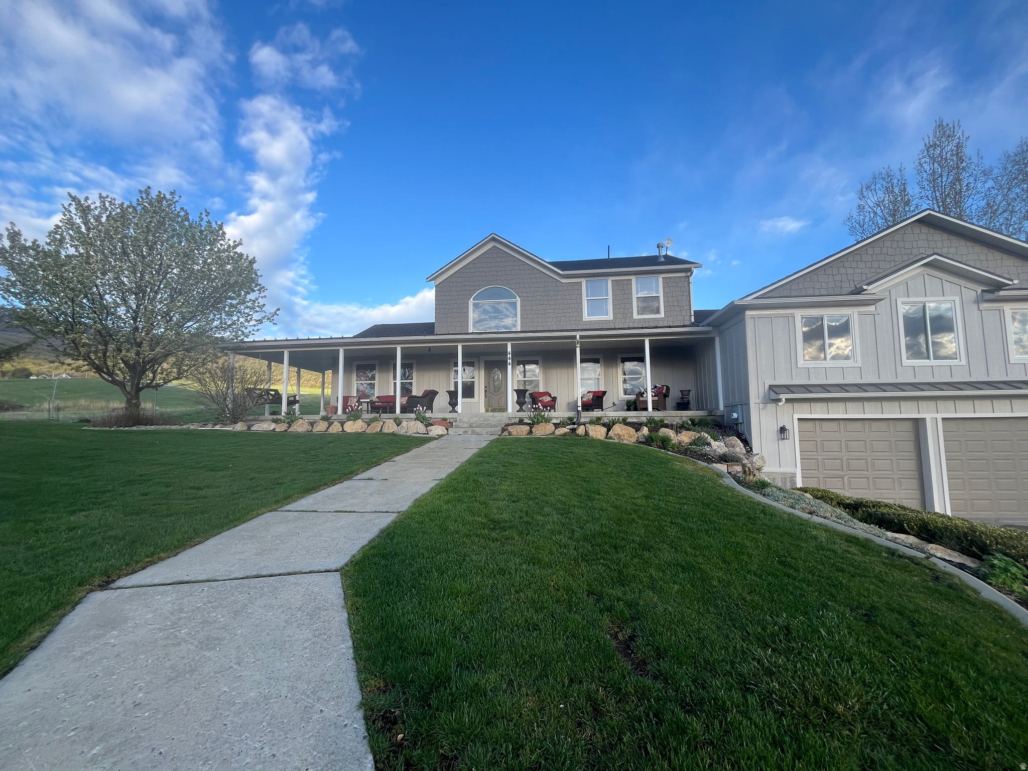 This home sits on 2.89 acres with amazing mountain and valley views with a large in ground fire pit. It is located on a private road and shares a private well. The property includes a 5,000 sq. ft. shop with three enclosed bays and one open bay. The shop also features a loft and a one-bedroom apartment complete with a full bath and kitchen. The main home features a grand staircase, a primary ensuite and amazing walk in closet, updated kitchen, plenty of storage, new siding and roof.  Please note that the home will be part of a future HOA established to handle snow removal and the maintenance of the private road. More photos to come!