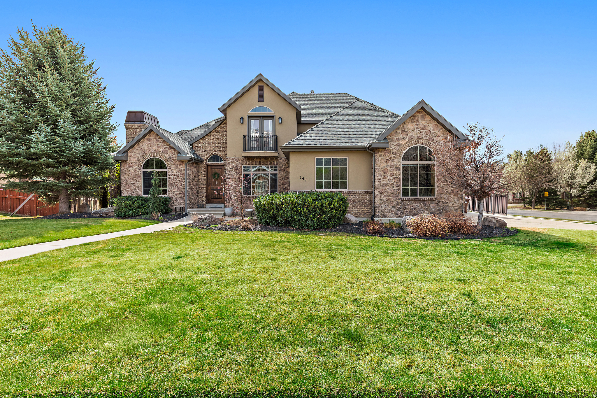 GREAT LOCATION* Highly sought after Deerfield area of Alpine's Whitby Woodlands neighborhood, this home offers a great combination of comfort, space, and location. CONVENIENT ACCESS to parks, schools, and downtown Alpine, with open space right across the street that adds a sense of privacy, room to breathe and great Mountian views. MAIN FLOOR LIVING with a large master suite. Large deck creates the perfect spot for gatherings or quiet evenings, and the fully fenced backyard helps to offer privacy. THREE CAR GARAGE with plenty of storage space and RV PARKING. Fully finished basement with storage space and a walk-out entrance making for the possible option of a future apartment set up. QUIET NEIGHBORHOOD and very low turnover as people enjoy living and staying in the area. Plus, there is room for more bedrooms as the original floor plan layout has space for up to 6-7 bedrooms. EASY TO SHOW.