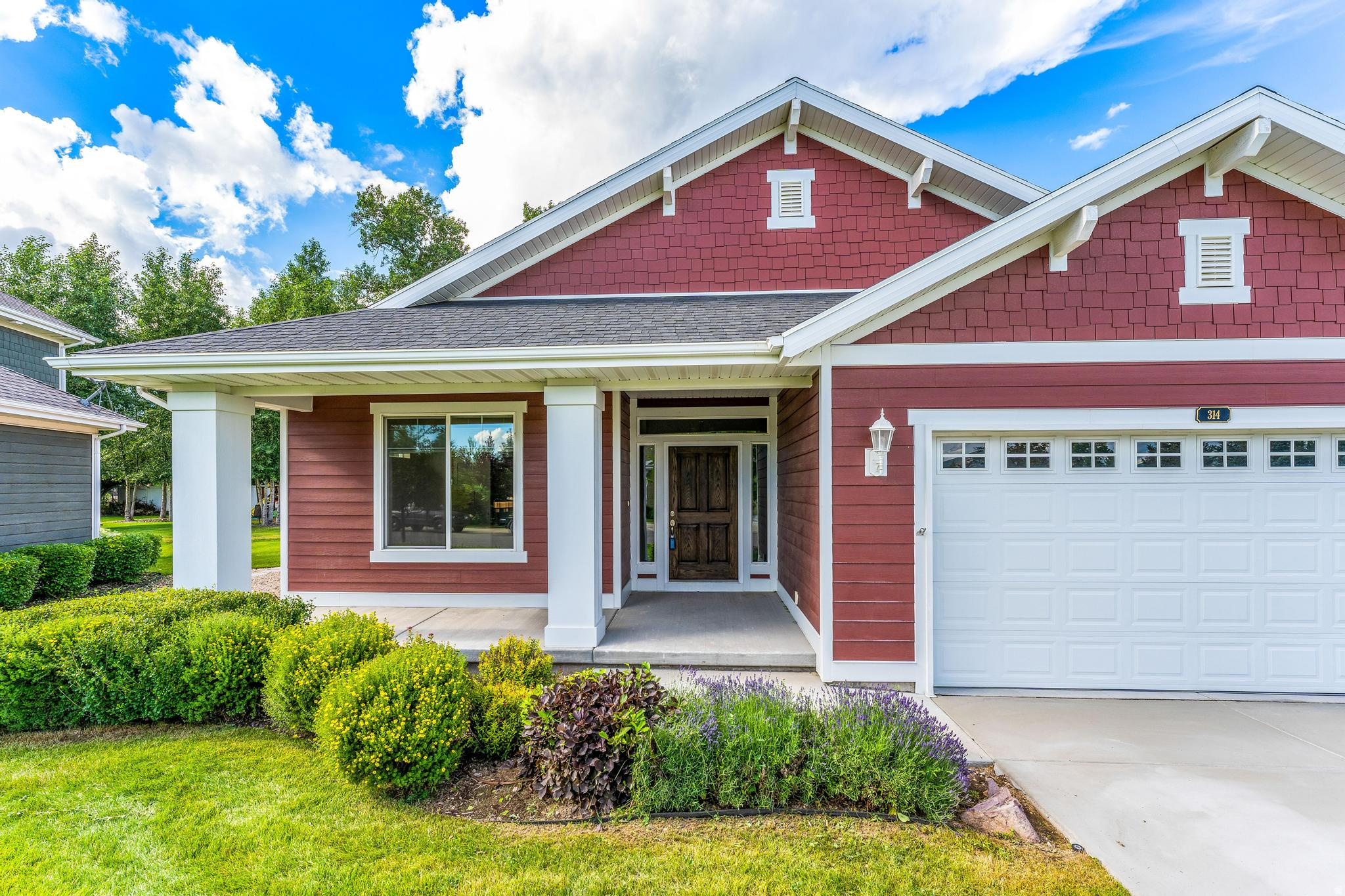 Beautiful main floor living in this thoughtfully designed Midway bungalow.  Built in 2015, this 3-bath home offers 2,160 sq. ft. of bright, open living space with high ceilings and large windows that fill the home with natural light.  The spacious great room flows seamlessly into the kitchen and dining areas, creating an idea layout for both everyday living and entertaining.  The main-level primary suite features a walk-in closet and a separate tub and range, gas fireplace, tile flooring, and a covered patio accessed through sliding glass doors.  The attached 2-car garage and fully landscaped yard with automatic sprinklers and convenience and ease.  Enjoy low-maintenance living with a well-managed HOA that includes yard care and snow removal. Buyer to verify all information.  Square footage figures are provided as a courtesy estimate only.  Buyer is advised to obtain an independent measurement.