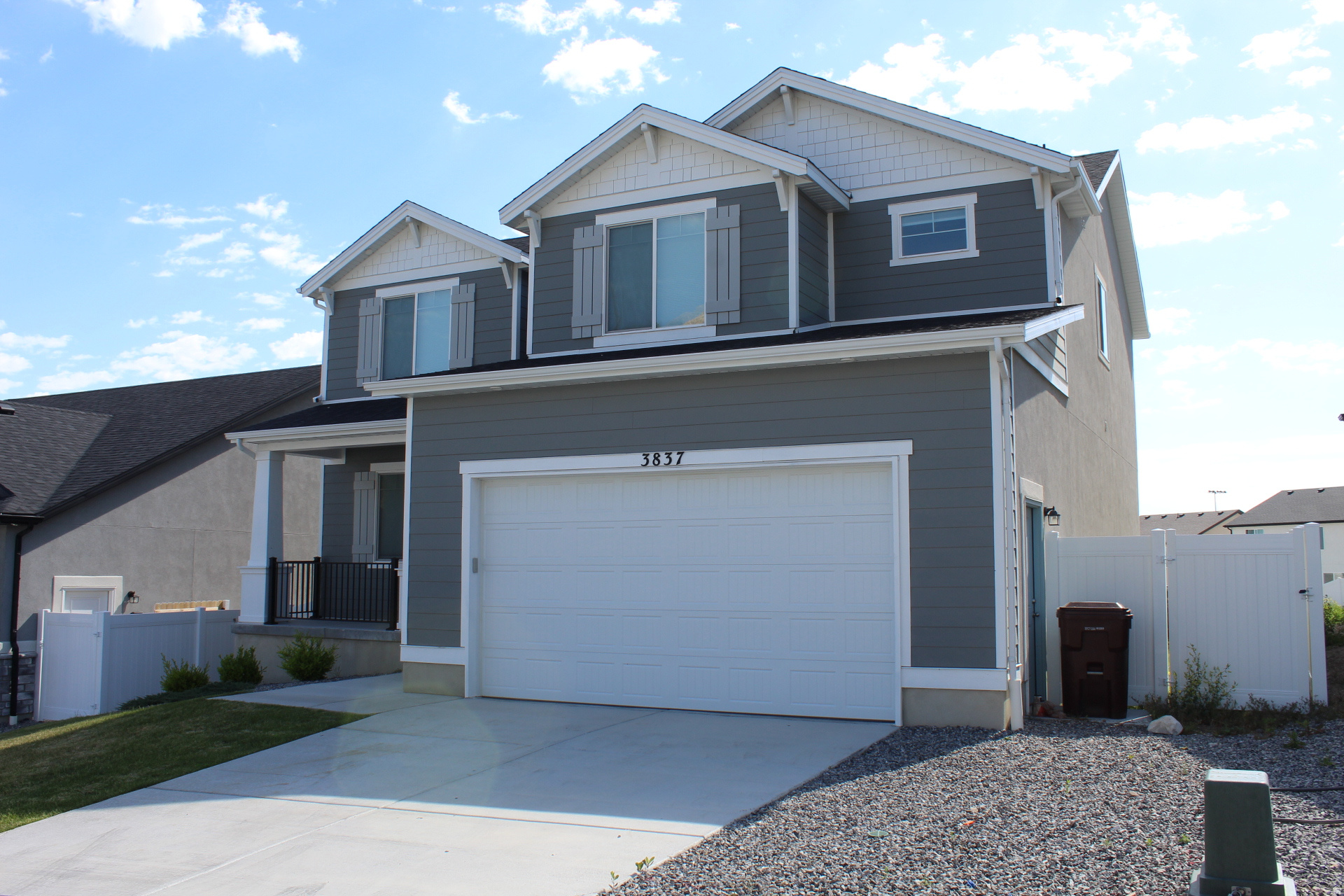 Welcome to this beautiful new home in the best location, nestled on the foothills of the Oquirrh Mountains with convenient proximity to downtown Salt Lake City.  This Gardner is tucked away in the back of the community near the mountains, with a large lot to enjoy!   Open layout with laminate flooring in the kitchen, dining, and living room; quartz countertops throughout, and stainless steel appliances in the kitchen. Room for a future family room, bedroom, and bath in the unfinished basement.