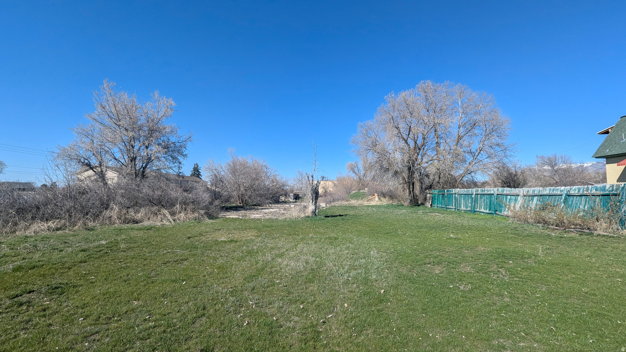 Prime 1.4-acre lot just off Center Street in Smithfield! This is a rare opportunity to secure a sizeable parcel with potential for building or subdivision (buyer to verify). Utilities are conveniently located along Center Street. Currently zoned R-1-12, this property offers flexibility while still being close to town amenities, making it ideal for a custom home or future development. Includes two parcels: 08-085-0008 (1.14 acres) 08-085-0011 (0.26 acres) Total: 1.40 acres. Opportunities like this don't come up often in this area-bring your vision and act quickly before it's gone! Contact us today for more details or to walk the property. Do not enter building without permission.