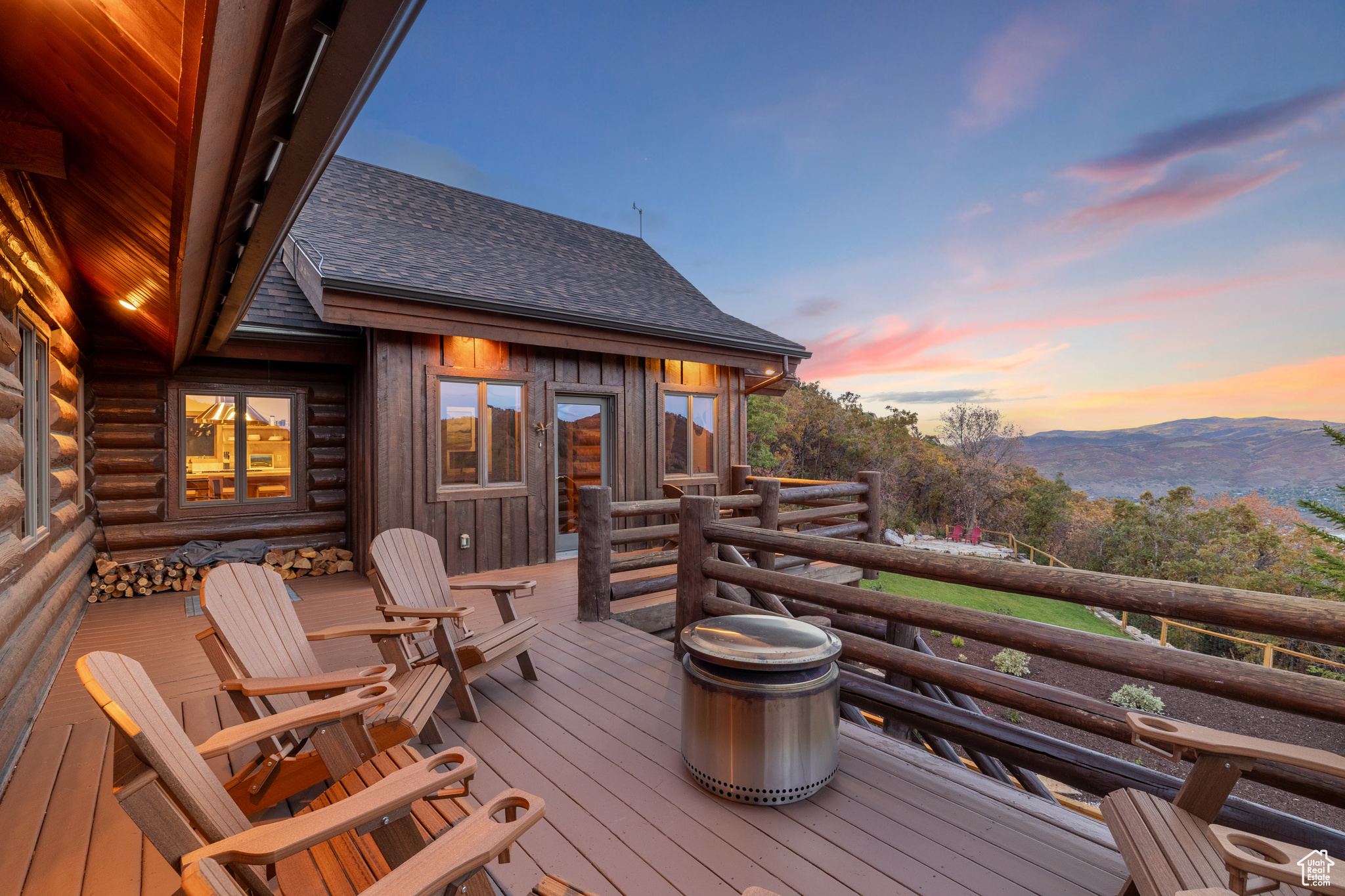 Escape to this Alps-inspired mountain chalet at the top of Pinebrook with unparalleled access to the outdoors, situated on a private wooded acre, surrounded by protected open space with stunning peak and valley views. This house's high perch has full sun exposure year-round, a newly terraced backyard, and an expansive, vaulted pine and light-filled great room creating a unique living experience immersed in nature. Wraparound decks and a new stone patio with fire pit extend the living space in every direction. For the outdoor athlete, access one of the only bolted local rock climbing crags just a few hundred yards away via a direct trail from the backyard, or enjoy miles of singletrack PCMR hiking and biking trails just steps from the front door. In winter, step into your skis down the block for stable and quiet backcountry touring on Murdock Peak and throughout Toll Canyon. Enjoy relaxing in front of the fireplace, showering in the new Moroccan-tiled shower, or cooking a feast in the open-concept, remodeled kitchen. Still only minutes to Park City, this sunlit, tasteful home is your gateway to the mountains.