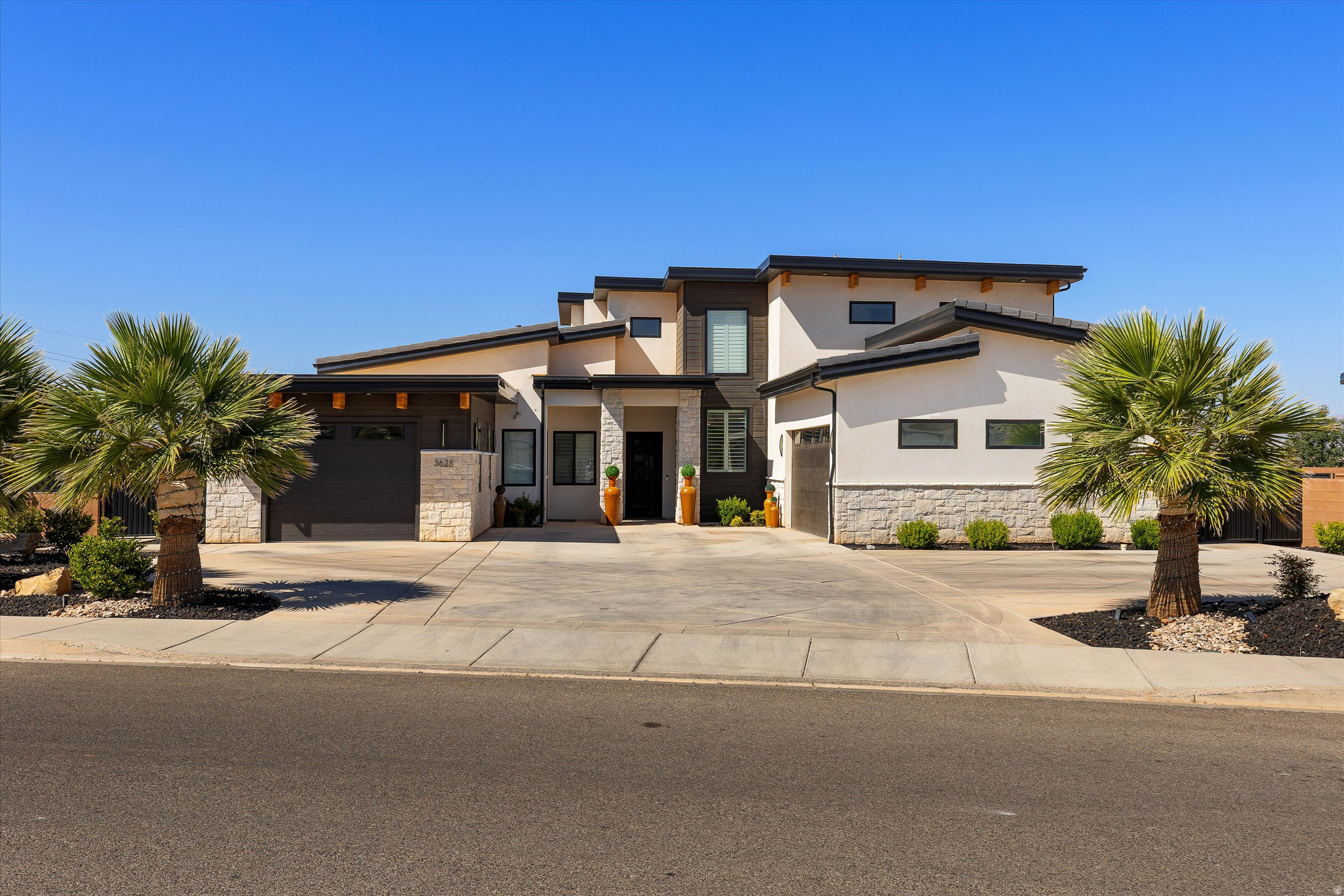 Spacious newer build on a large lot in Washington, UT-directly across from the new Washington Wheels Park. Enjoy stunning views over Washington Fields and endless potential with room to expand. Features a 2 bed/2 bath ADU, ideal for multigenerational living. Backyard is prepped with plumbing for a pool and outdoor kitchen, wiring for exterior lighting, and a covered overhang designed for a future deck.