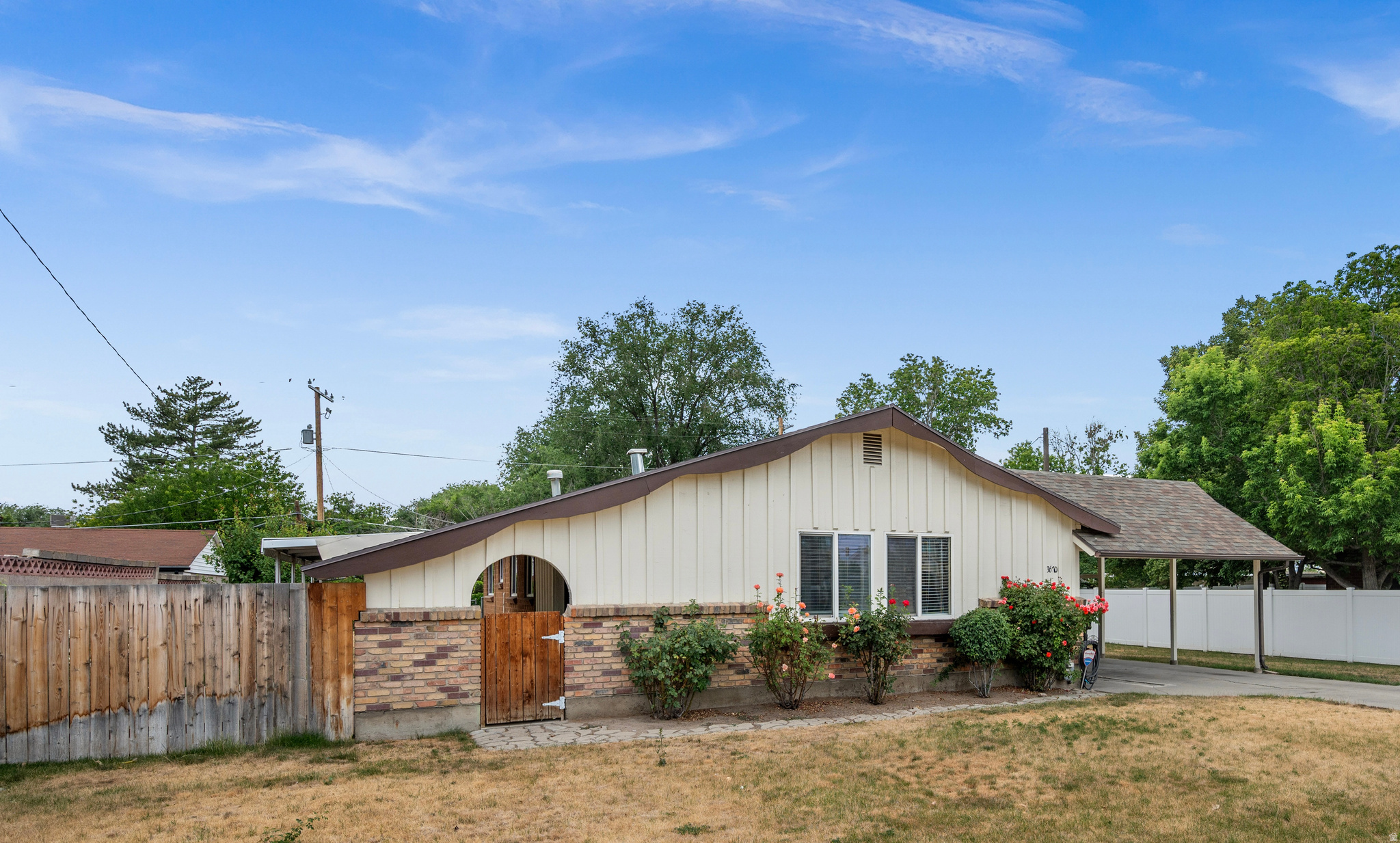 Welcome to this well-cared-for, affordable rambler where pride of ownership is evident from the moment you step inside. The spacious kitchen offers excellent flow to the dining area and opens to a private covered patio-an ideal space for entertaining family and friends or simply relaxing outdoors.  The generously sized bedrooms provide comfortable living, and the primary bedroom features two closets for added storage. Situated on a spacious 0.25-acre lot, the property offers plenty of room for outdoor activities, gardening, or even a future addition.  Major updates have already been completed, including the furnace, central air conditioning, and water heater, providing added peace of mind. The range and refrigerator are also included, making this home truly move-in ready.  Conveniently located within walking distance of shopping and TRAX, with freeway access just one mile away, commuting is quick and easy. Whether you're a first-time homebuyer or looking for a solid investment opportunity, this home is one you won't want to miss.