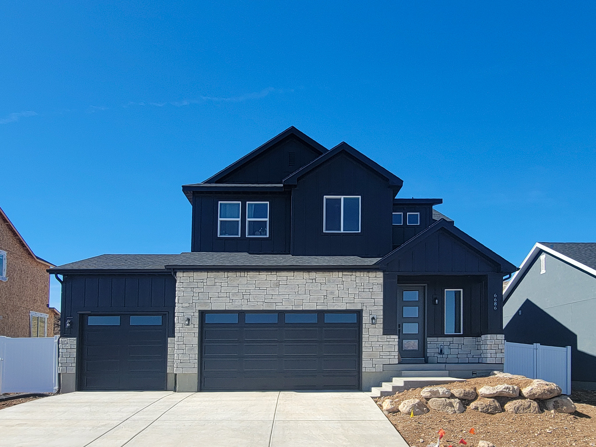 Completion estimated in October. This home is under construction and cannot be walked through at this time. We have a model home of a Sycamore floorplan on site that can be viewed during our open model office hours: 10a-6p Mon, Tues, Weds, Fri, Sat; 12p-6p Thurs; CLOSED SUNDAYS. All Options have been selected for this home. Pictures are of a different Sycamore home with a different colors and options than this home for sale. Welcome home to the Sycamore - where thoughtful design meets everyday comfort. Gather with friends and family in the spacious great room, create memorable meals in the gourmet kitchen, or unwind in the peaceful primary suite after a long day. Enjoy elevated living with a    stunning second-story deck, perfect for morning coffee or evening sunsets, plus a walk-out basement that opens the door to additional entertaining space, recreation, or future possibilities. The versatile bonus room gives you the flexibility for a home office, playroom, media lounge, or whatever fits your lifestyle best. The Sycamore offers the perfect backdrop for both quiet moments and life's biggest celebrations.