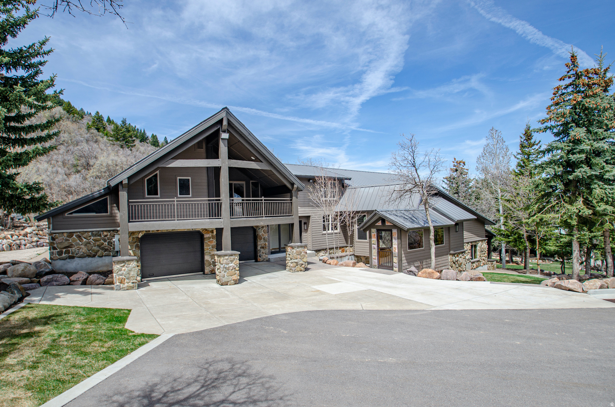 This one-of-a-kind mountain retreat sits nestled below Nordic Valley and is minutes away from Powder Mountain, Snowbasin, Wolf Creek and Pineview Reservoir. Enjoy the beautiful scenery and seclusion from one of the covered decks. Inside you'll find plenty of space filled with cozy and beautifully crafted wood details.  Gourmet kitchen with custom cabinets, granite countertops, tile backsplash and stainless steel appliances. The home also features newer flooring and paint. Hidden walk in safe, 2 floor master bedroom and bath are just a few of the features you need to see in person. Newer roof, 2 newer furnaces, newer A/C unit, 2 newer water heaters, and almost all electrical is new or has been updated in the last few years as well. Garage provides plenty of room for storage and toys. Seasonal stream in the back of the property.