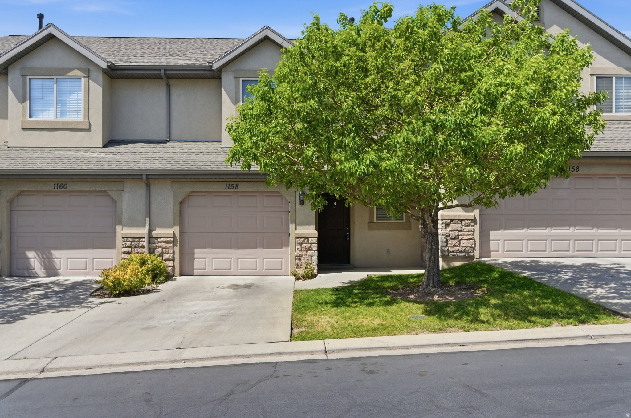 Life feels a little easier in Tanglewood. This move-in ready townhome puts you right in the middle of everything! Quick I-15 access, minutes to UVU, Utah City, Vineyard hot spots, shopping, movies, and dining, while still feeling tucked into a quiet, neighborhood setting. Inside, the layout is bright, open, and functional with easy flow from the kitchen to the patio and wide open green space behind the home. Mornings on the covered porch hits different with mountain and lake views in the background, and the attached garage plus fiber internet availability make everyday life just plain convenient. This  community brings the fun, too! Playgrounds, basketball courts, picnic spots, BBQ areas, and open grassy spaces without the weekend landscaping chores because the HOA handles it for you. Basically, more living and less mowing. Come see this one today!