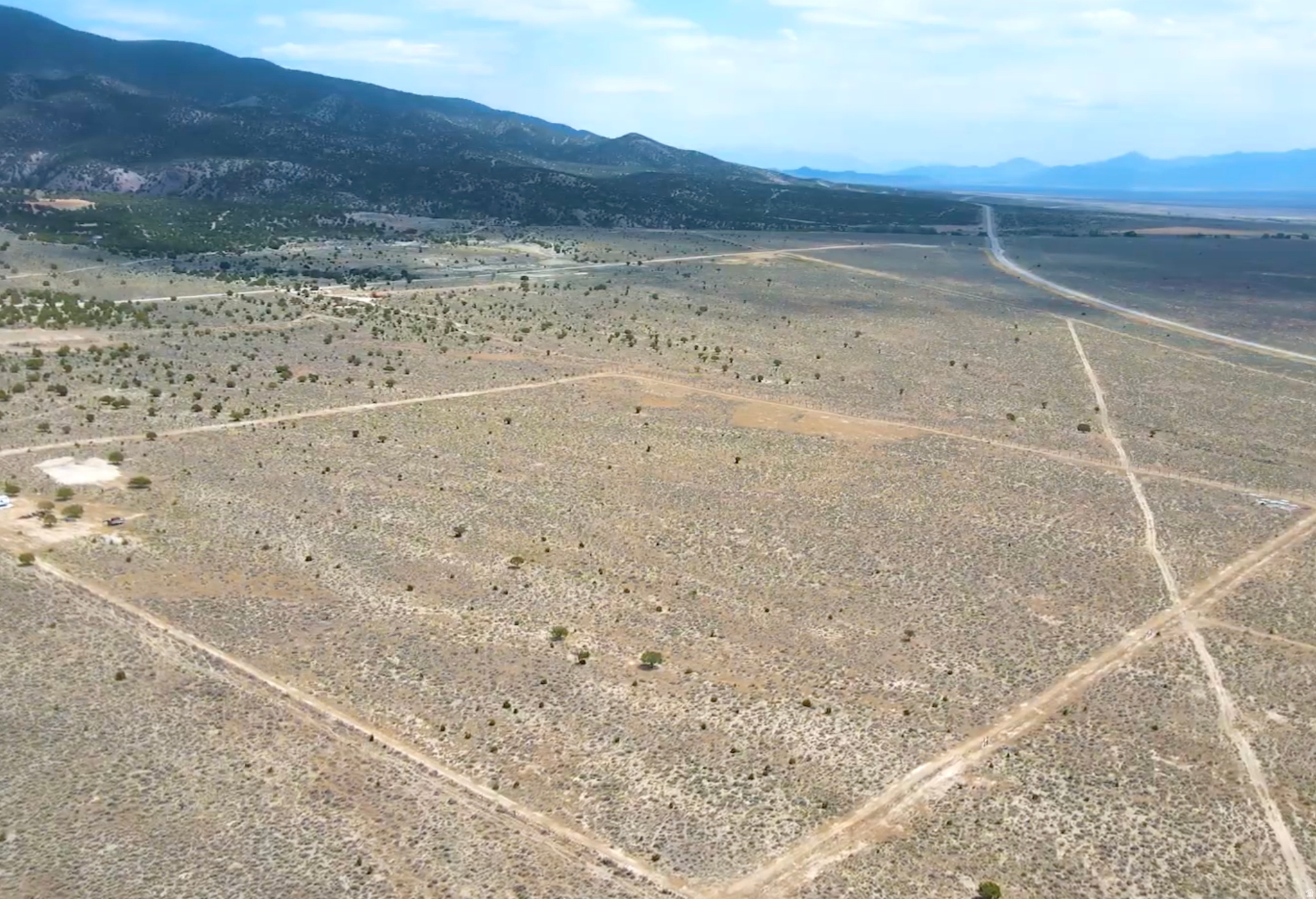 Discover the possibilities with this beautiful acreage parcel in Tooele County! Offering approximately 40 acres (buyer to verify), this property provides the perfect opportunity for recreation, investment, agricultural use, or building your dream retreat. Enjoy wide-open spaces, stunning mountain and valley views, and the privacy that comes with owning your own piece of Utah. Water rights included with the property. Convenient access while still offering a peaceful rural setting. Buyer to verify all information, including acreage, zoning, utilities, water rights, and intended use.