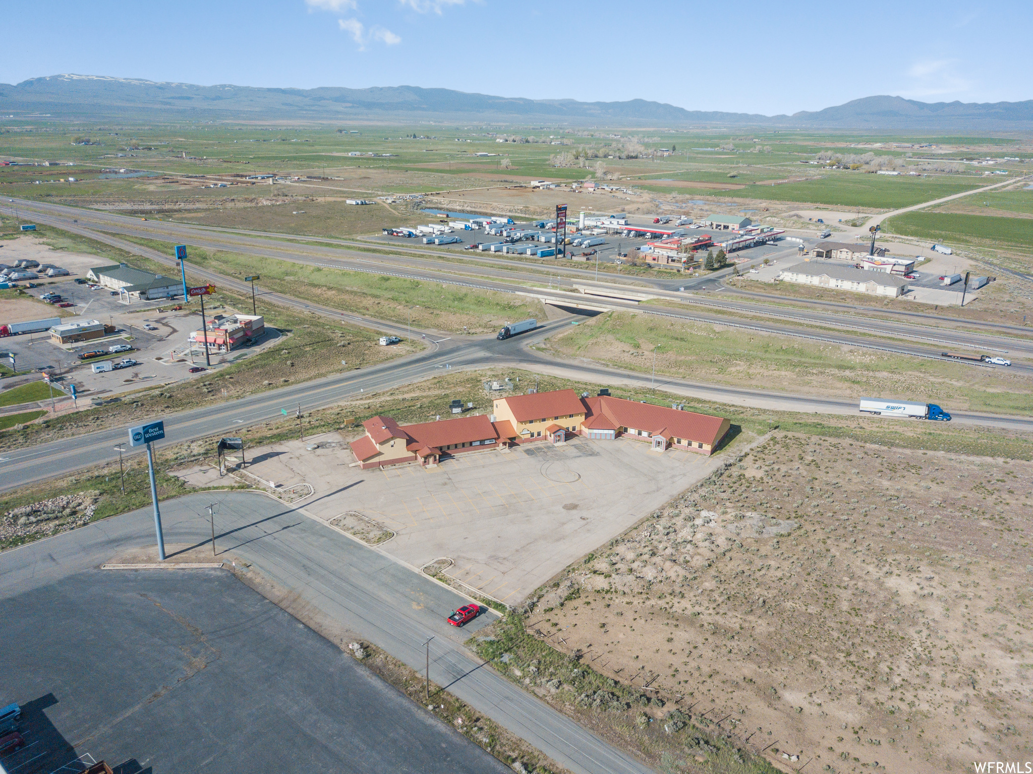 Fabulous one of a kind listing on Beavers North I-15 interchange! High visibility freeway high traffic area, over 20,000 square foot building with multiple turnkey business possibilities, some equipment, living space, & other great opportunities all on 1.63 acres Possibility of 6 restaurant spaces, equipped, metered separately, and ready to go, 3-5 apartment areas, large paved parking lot, and so much more to see and dream about your future plans for this wonderful wide open opportunity! Must see to appreciate all this listing has to offer! Seller financing available with 25%down payment at 3% interest ten year term! Payment can be amortized over longer period of time with balloon payment at the end of term.