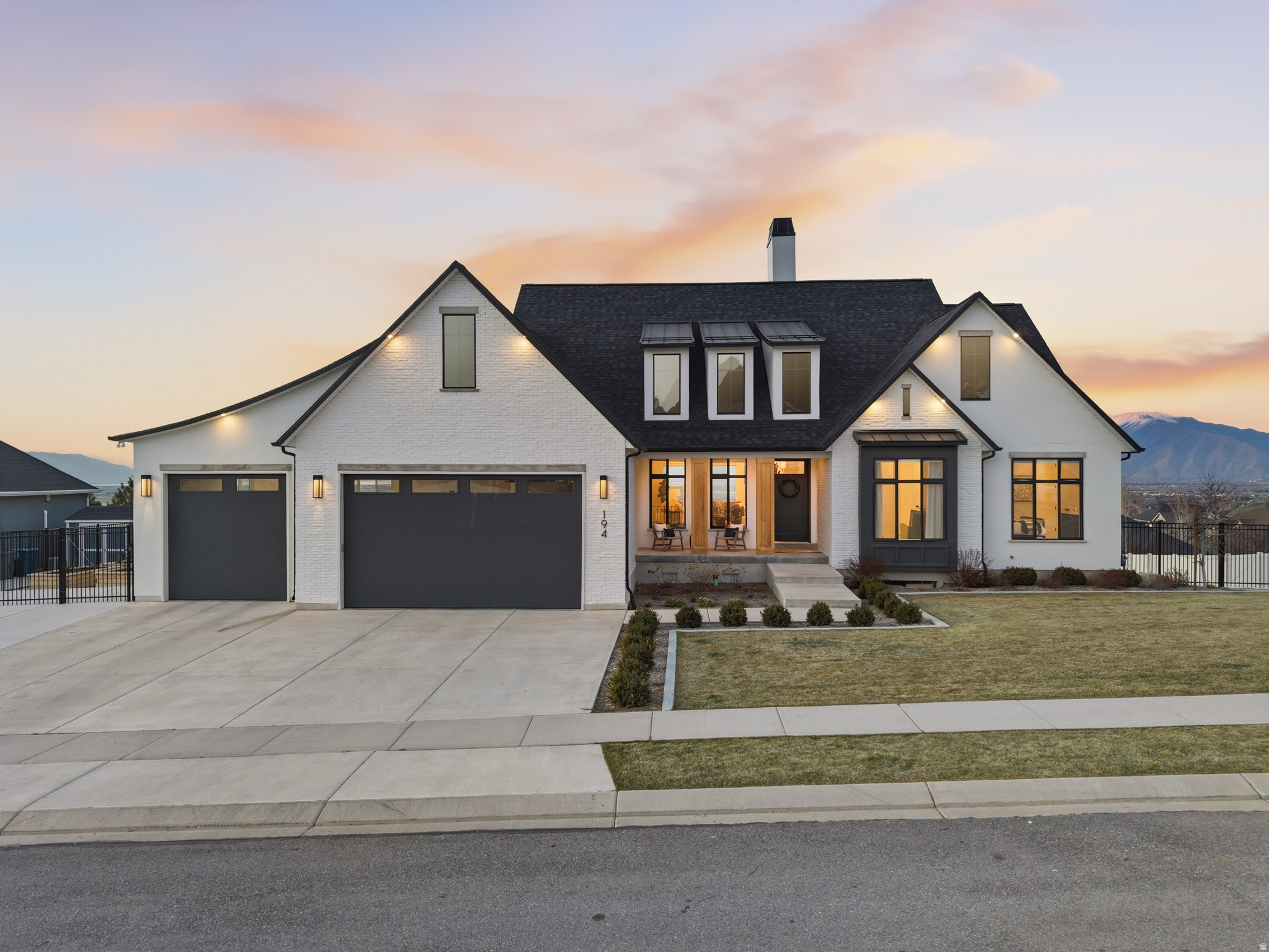 Thoughtfully custom-built with no expense spared, this home is packed with intentional upgrades and quality you can feel the moment you walk in. High-end cabinetry runs throughout the entire home, paired with engineered hardwood flooring and a truly oversized kitchen island designed for gathering-complete with additional storage on the back side. Every space was designed to be both functional and elevated.  The basement is dialed in for entertaining and everyday living, featuring a full surround sound system and a dedicated home gym. Comfort and efficiency are built in with a reverse osmosis (RO) water system and whole-home humidifier.  Step outside to a waterproof deck positioned to capture breathtaking, unobstructed 360-degree views of the mountains and valley-sunrises, sunsets, and everything in between. The yard is fully fenced and includes a well-maintained organic garden, with ample space to enjoy and expand. RV parking adds flexibility, and the oversized garage is outfitted with built-in storage racks to maximize every inch.  Located with quick, convenient access to I-15, you're just minutes from Spanish Fork, Payson Canyon, and the extensive trail systems in Elk Ridge-offering the perfect blend of privacy, views, and accessibility.    Square footage figures are provided as a courtesy estimate only and were obtained from Building Plans .  Buyer is advised to obtain an independent measurement.