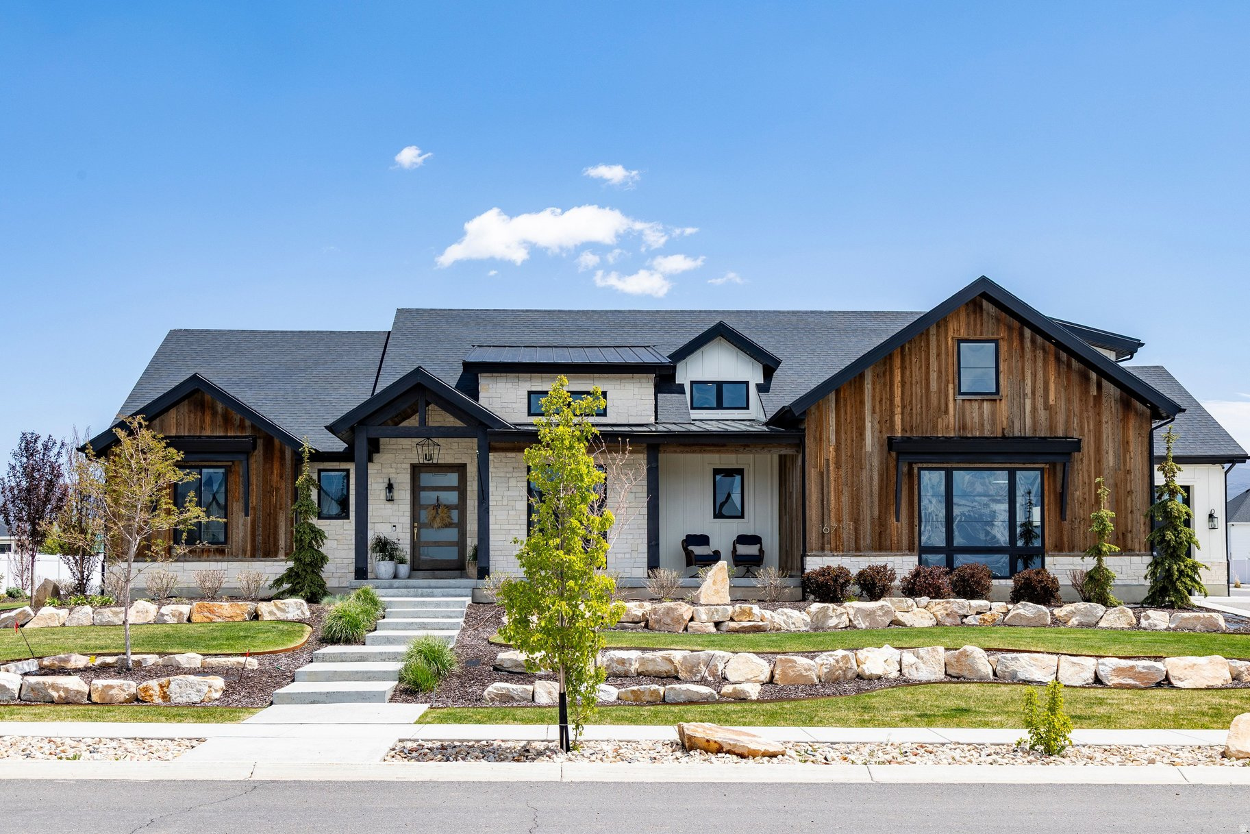 Custom-built home in Section 1 of Christensen Farms development.  High-level finishes throughout, top-of-the-line appliances, and extra large counter space for food prep and entertaining. A spacious kitchen and family room with vaulted ceilings and expansive windows fill the home with natural light and are ideal for gathering with family and friends. The lower level boasts another family room and more bedrooms and baths.  It opens to a spacious yard with a sports court and room for other outdoor recreation. A HUGE DETACHED TOY BARN/GARAGE (approx 2400 sq. ft. floor space and over 15' ceiling) is perfect for storage of all your recreational vehicles.   You are only minutes from 72 holes of Championship golf at Wasatch and Soldier Hollow, Blue Ribbon fishing on the Provo River, and water sports on Deer Creek and Jordanelle Reservoirs. World-class skiing and snowmobiling is also just a short drive from home. This is truly a unique and exciting place to live. Detached garage has a finished Mother-In-Law apartment. Mother in law suite includes 2 bedrooms, 2 full baths, Kitchen, and Family room, adding an additional 1700 square feet of living  space to this home.