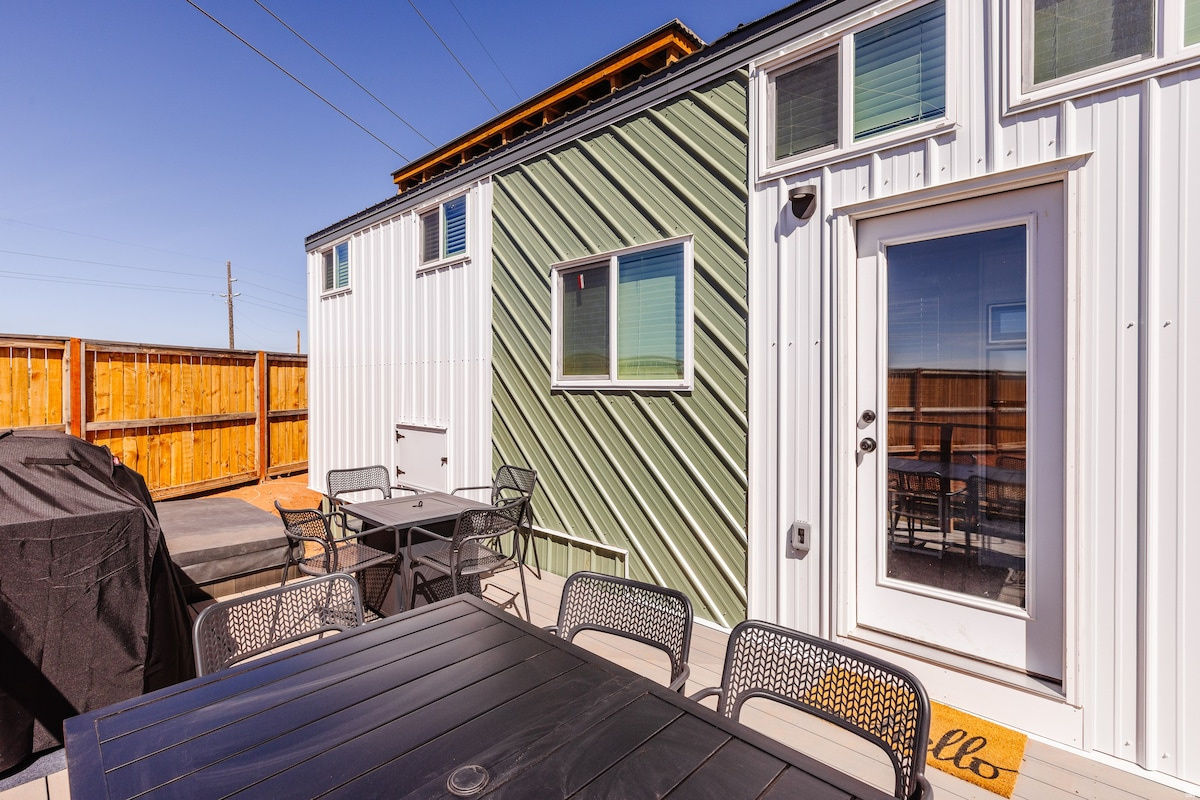 This income producing Tiny Home is ready for a new owner who wants to invest money or make it a 2nd home get away. It is professionally managed with an onsite manager to make it a stress free and easy investment process. Located close to St. George and Zions National park, It is currently being rented out as a nightly rental.  Sleeps 7 with a hot tub and roof top deck to enjoy the peaceful nights.  This is the perfect home away from home with all the bells and whistles.