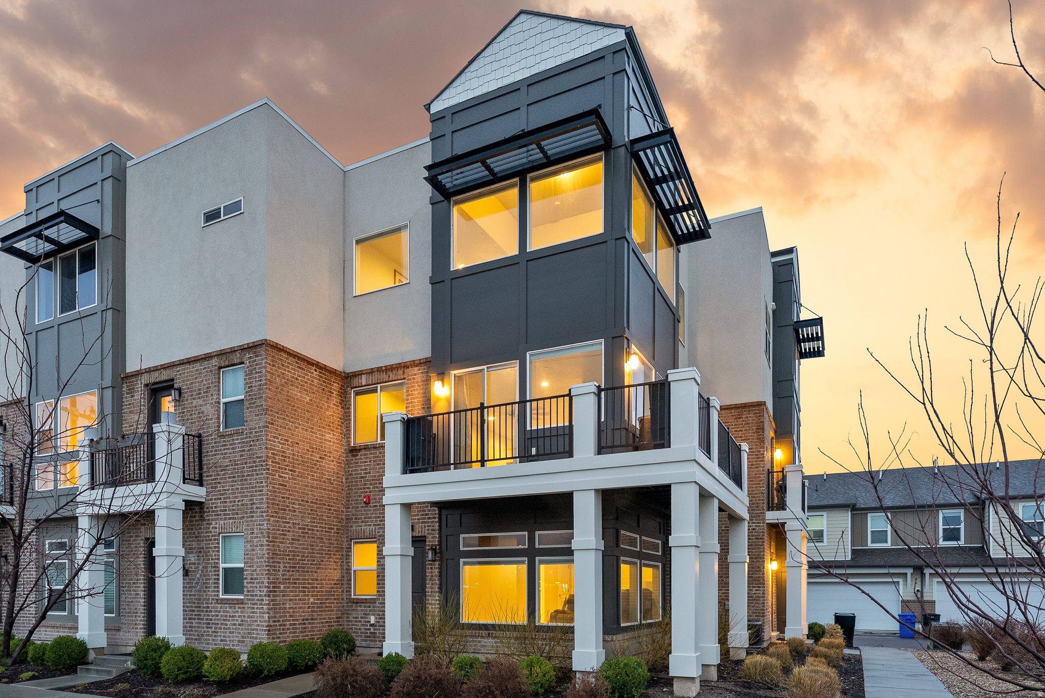 The best value for square footage in the area. This immaculate home immediately feels different. As one of the largest end-unit townhomes in the community, it offers rare space, natural light, and flexibility-ideal for families or anyone wanting room to grow. Windows on multiple sides create a bright, open feel throughout. The layout works beautifully for everyday living, from movie nights in the theater room to gathering in the inviting family room. The primary suite is a true retreat with a spacious bath and mountain views. Additional bedrooms provide space for kids, guests, or home offices. Just minutes from Station Park, this move-in-ready home combines comfort, convenience, and a layout designed to grow with you.
