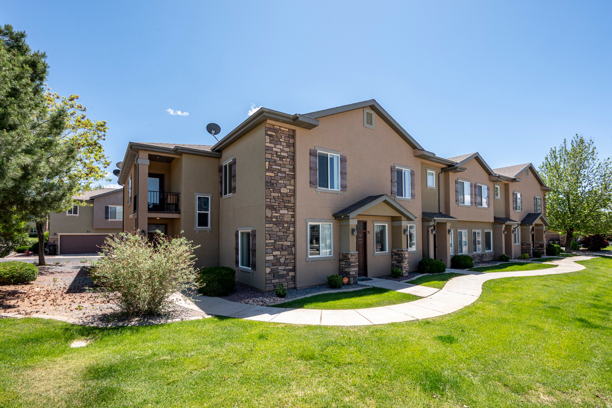 Welcome to Cedar Crossing, where comfort, convenience, and lifestyle come together in this stunning 3-bedroom, 2.5-bath end-unit townhome. Offering 1,570 square feet, this large, beautifully upgraded home is designed for modern living with spacious interiors, natural light, and exceptional attention to detail throughout. Stainless steel appliances, LVP flooring, upgraded carpet, Speed Queen washer & dryer, and smart-home features including a Vivint security System, smart lock and smart thermostat. Located in one of the area's most desirable communities, this home delivers unbeatable value with close proximity to hospitals, schools, shopping, dining, and endless recreation opportunities. Enjoy resort-style amenities including a pool, clubhouse, 24 hour fitness center, full service kitchen, an indoor gathering area, movie room, playground and more. While the HOA also covers fiber internet, water, trash, and additional services for effortless living.  Immaculately maintained and situated in a clean, welcoming neighborhood, this end-unit offers added privacy and charm. More than just a place to live, this home is built for a lifestyle - combining convenience, community, and style all under one roof. Seller is motivated, come see today!