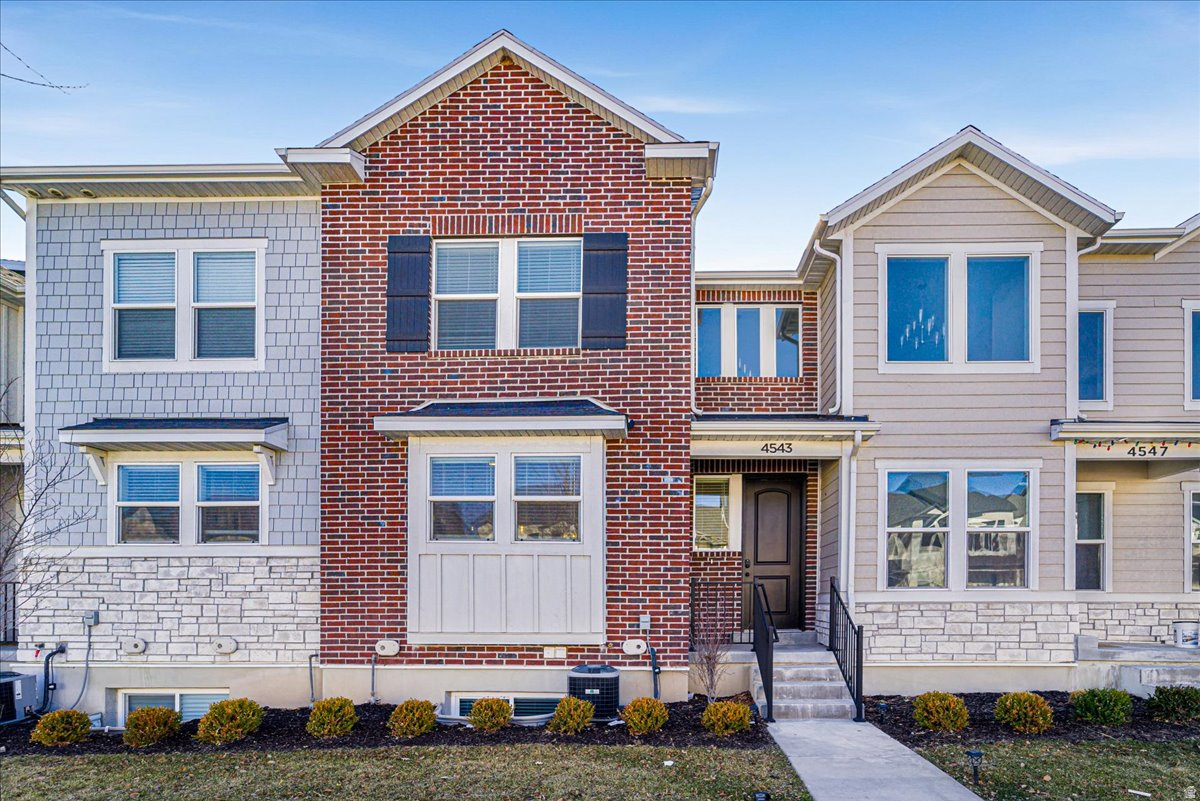 Income producing property! Stunning Townhome with Separate Basement mother-in-law w/separate entrance in Herriman! Featuring a fully separate basement mother-in-law with its own private entrance, this home offers a fantastic opportunity for rental income, multigenerational living, or a private guest suite. Main Home Features: Spacious 3 bed, 2.5 bath layout with modern finishes, high end cabinets & countertops. Attached garage & additional parking Basement MIL Highlights: Completely separate 1 bed, 1 bath unit! Full kitchen with modern appliances Cozy living space and private laundry Private entrance separate with a solid core door & deadbolt access. Don't miss this rare opportunity to own a home with a fully independent rental unit-perfect for investors or homeowners looking for extra income!  Basement is currently rented month to month for $1,300/mo.  Upper two floors are vacant ready to be owner occupied!