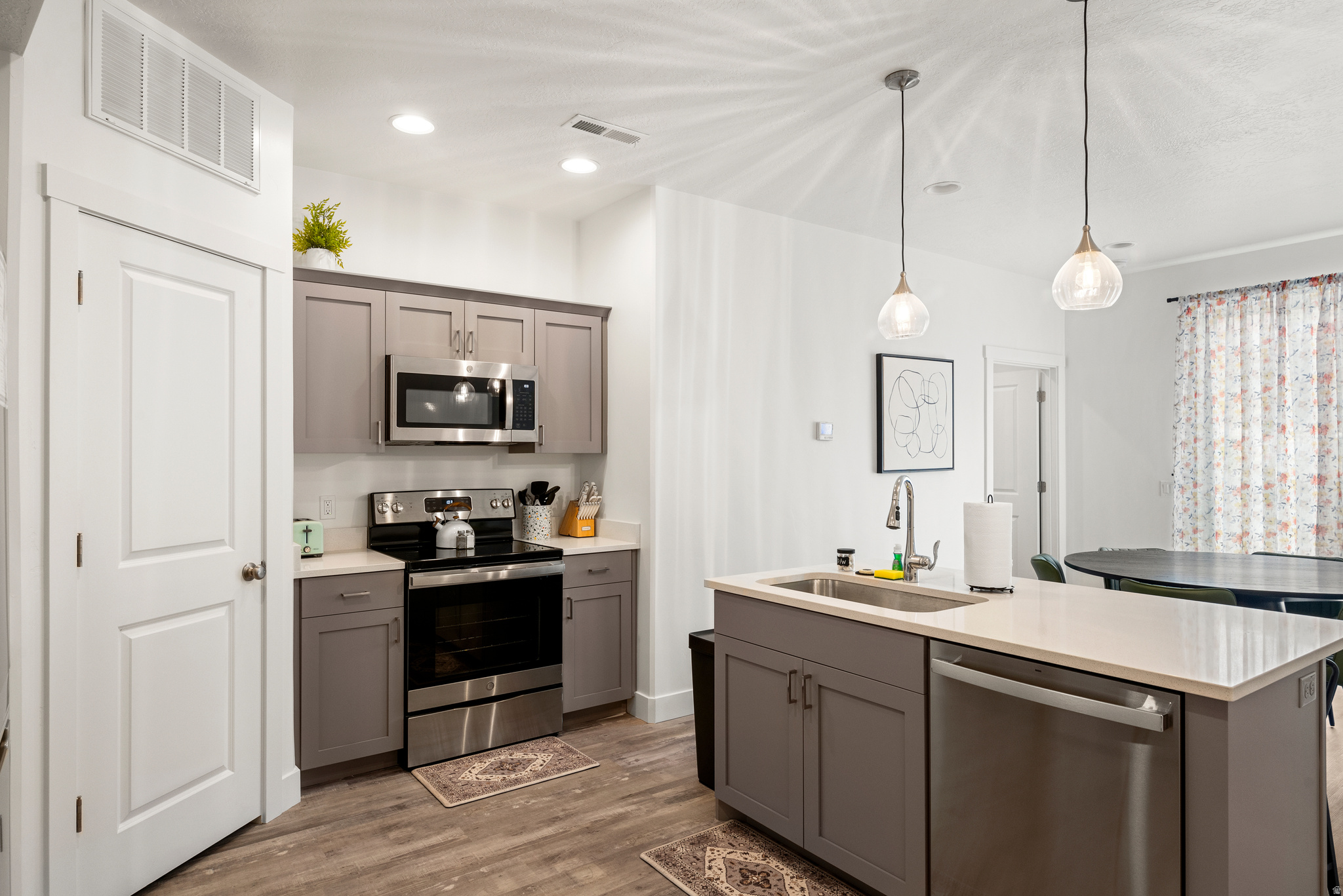 Escape the 9-to-5 grind without ditching your day job: Snag 1/8th of Blue Bear Lake Townhome and unlock 45+ nights of turquoise-tinted paradise yearly. We're talking shares in an LLC that owns this 2,075-sq-ft stunner outright-no timeshare traps here. Crafted by FRAXIONED, it's your hassle-free ticket to Bear Lake's electric blue allure, where the water's so clear, you'll swear it's Photoshopped. Perched in Garden City, UT, mere minutes from the marina, this 3-bed, 3-bath retreat gazes out over sparkling waves and jagged peaks that make Instagram weep. Inside? Quartz counters that scream "chef's kiss," a lofted game den with an electric fireplace for those "just one more round of Monopoly" marathons, and a 2-car garage begging for your paddleboards (or that questionable '80s RV). Fully furnished and turnkey for short-term rentals-because who says your slice of heaven can't pay for itself? Summer? Dive into boating bliss or beach-laze like a pro. Winter? Shred 20 minutes away at Beaver Mountain. Spring/fall? Hike trails that whisper secrets only the mountains know. Unlike stuffy co-ops, sell your share anytime, ride the appreciation wave, and 1031-exchange like a tax wizard. Claim your co-owned idyll: 100% luxury, 1/8th the commitment. Memories (and maybe a few epic wipeouts) await. Inquire before it's sold to that guy that takes your place at the boat dock! Finally, YOU have access to the unit during Raspberry Days - August 3rd9th.