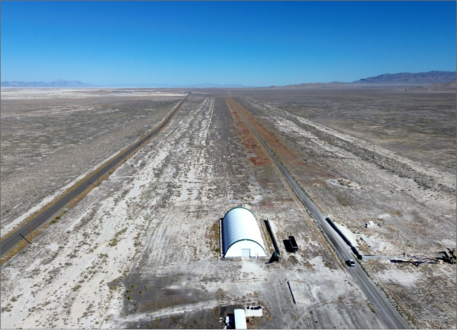275.4 acres located 35 miles NW of Grantsville, Tooele County, UT. Access along Tooele County paved roadway Grayback Hills Drive. Adjacent south of Clean Harbors Waste Management Facility. Zoned MG-H (Hazardous Waste) & MU-40 (Multiple Use-40 acre min).  Seller controls Western Gypsite Corp - Lessee of gypsum mining rights on 10,000 acres of BLM land (avail for separate purchase). Gypsum is a soft, widely used calcium sulfate mineral used in agriculture, construction, medical, food, and household products.  Tooele County parcel: 04-047-B-0001, 2025 taxes: $8,822.09. 4.5 miles NE of the I-80 Knolls exit, 45 miles east of Wendover, NV. 50 miles northwest of Tooele, UT, 65 miles east of SLC, UT.