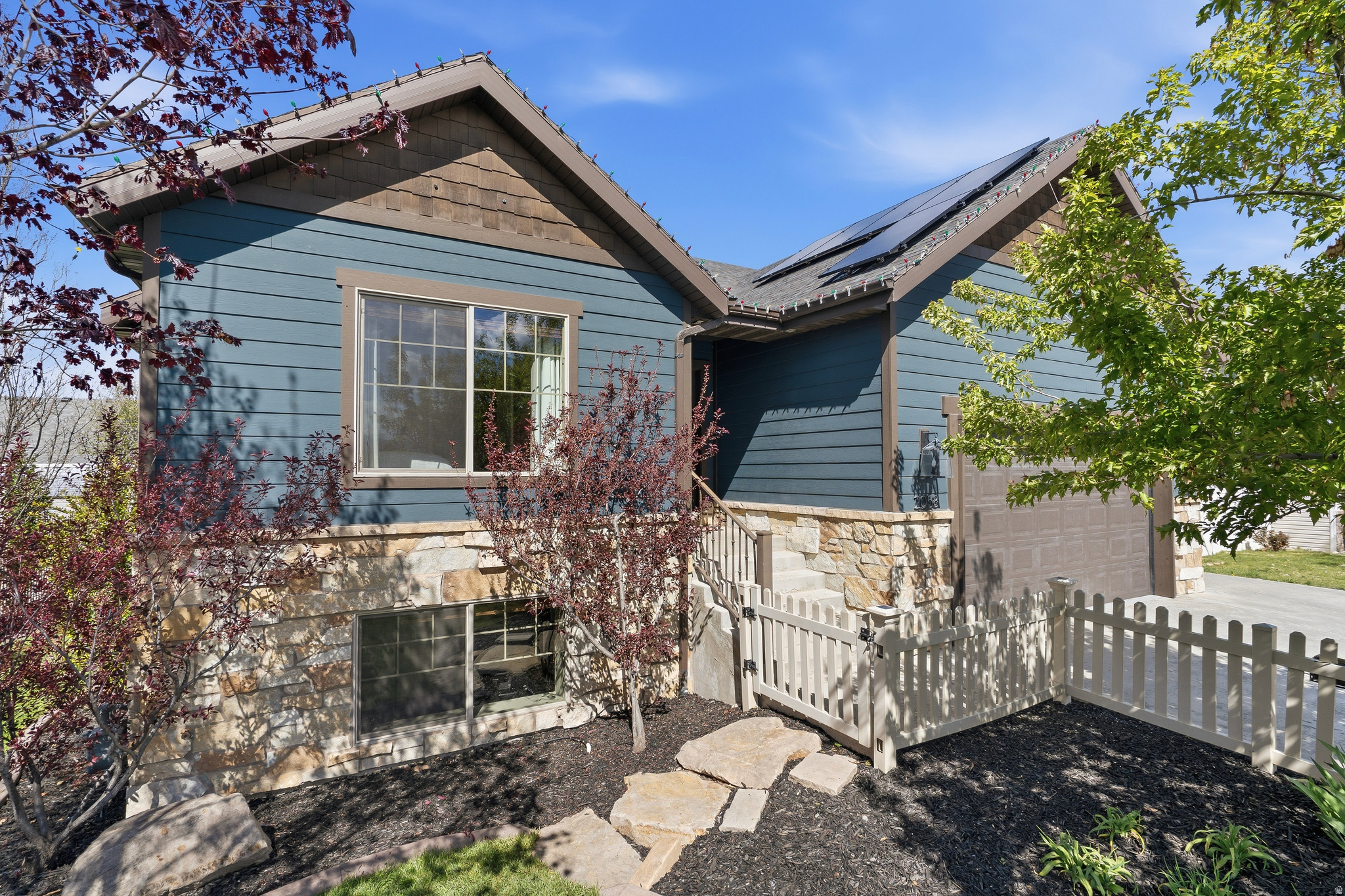 Set in a quiet, established neighborhood in Heber City, this well-cared-for 5-bedroom, 3-bath home offers space, privacy, and a complete comfort. Mature trees frame the fully fenced yard, creating a peaceful setting ideal for relaxing, entertaining, or simply enjoying the surrounding mountain air. Designed with convenience in mind, this home features true main floor living, including a spacious primary suite and main floor laundry-ideal for ease and accessibility. Inside, you'll find expansive living areas filled with natural light, perfect for both relaxing and entertaining. The kitchen is a standout, showcasing granite countertops, generous cabinetry, and ample prep space for gatherings of any size. Meticulously cared for, the home reflects pride of ownership throughout. Enjoy the benefits of fully paid-off solar panels, offering energy efficiency and long-term savings. A 2-car garage provides added convenience and storage. Located just minutes from renowned golf courses, fishing, boating, and endless hiking and mountain recreation, this property delivers the best of Utah's outdoor lifestyle. Whether you're searching for a full-time residence or a peaceful getaway, this home offers comfort, functionality, and a stunning natural setting.
