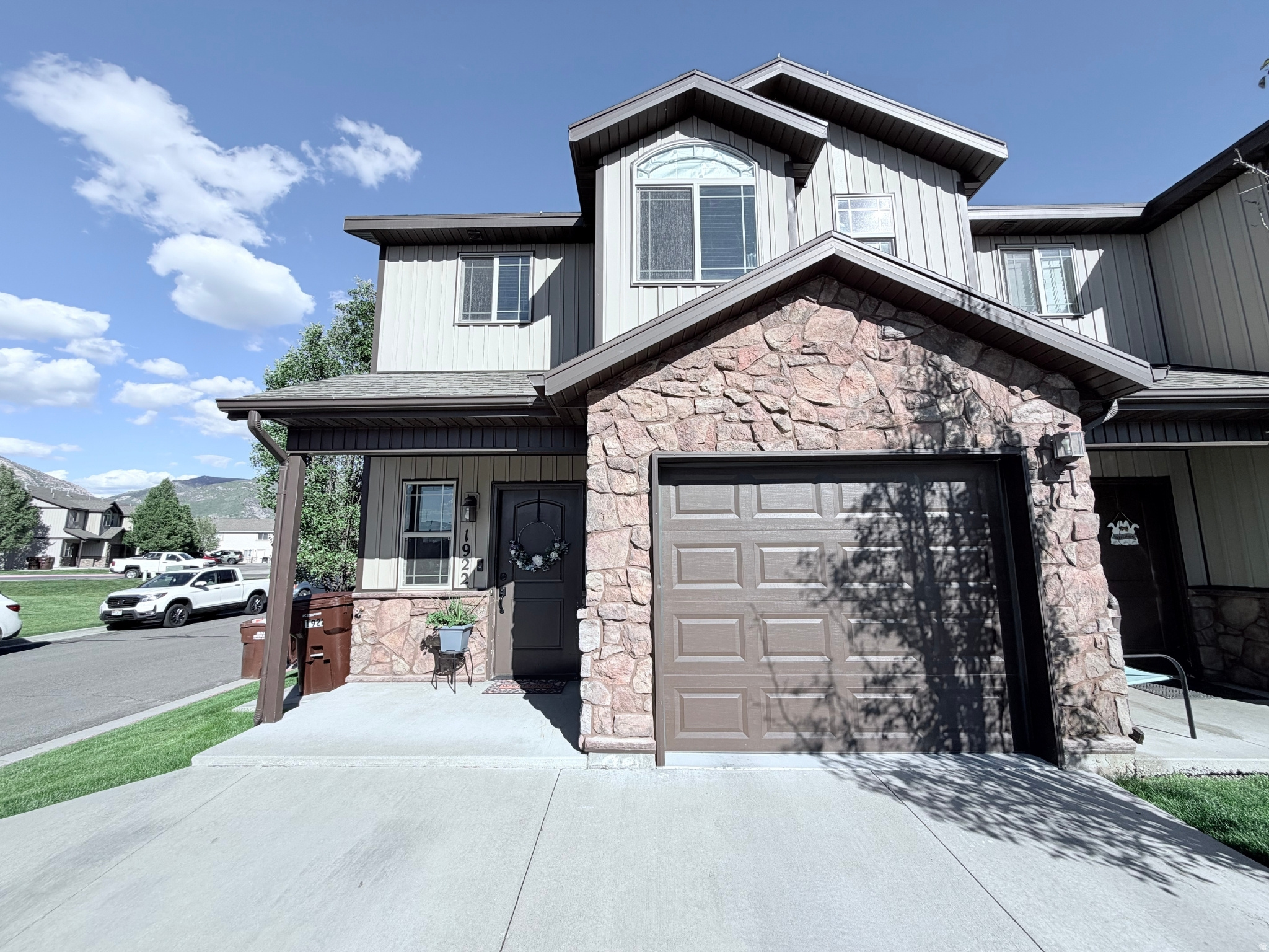 Start making your memories here! Check out this beautifully maintained end unit featuring mountain views, abundant natural light, and a covered front porch. Washer and dryer included! Let the HOA handle the landscaping and snow removal so you can spend your weekends relaxing! Call now!