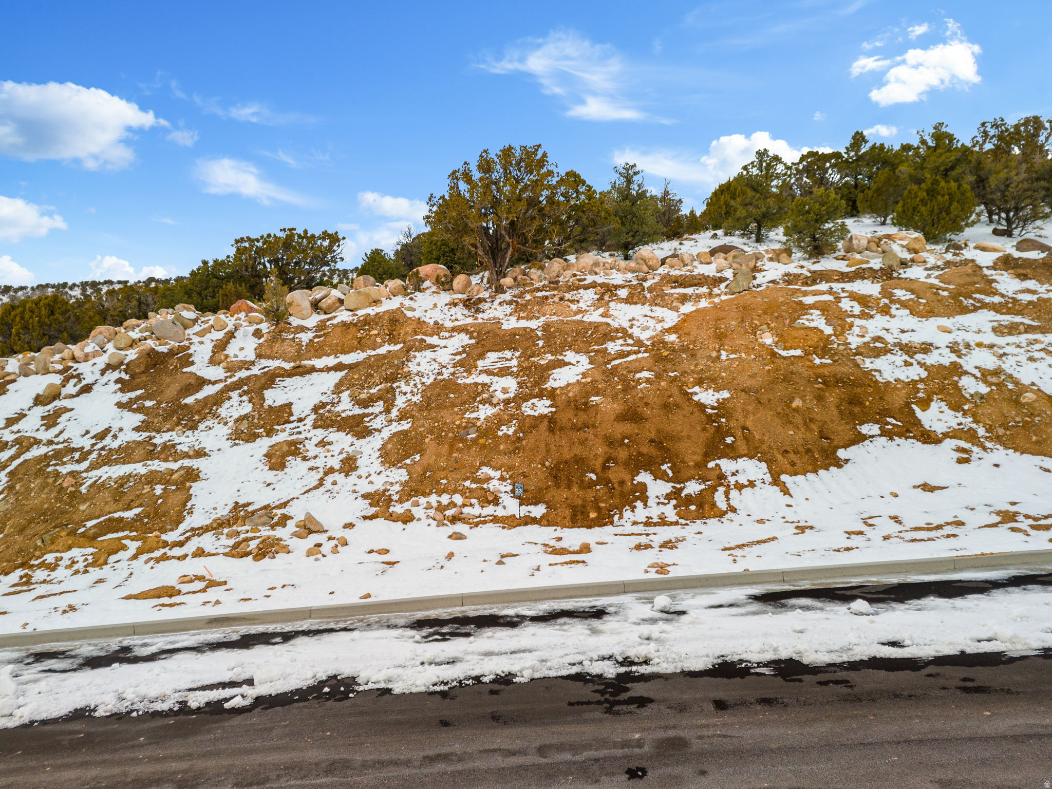 This is Lot Number 23, a 1.63-acre homesite located in the highly sought-after Estates at South Mountain subdivision. Enjoy stunning views of Shurtz Canyon and the surrounding Southern Utah mountains. This growing community is positioned near planned future elementary, middle, and high schools, adding long-term value and convenience. Bring your own builder or choose to build with the South Mountain Development Group. Don't miss this opportunity to secure a premium lot in one of Cedar City's most desirable neighborhoods. No HOA.