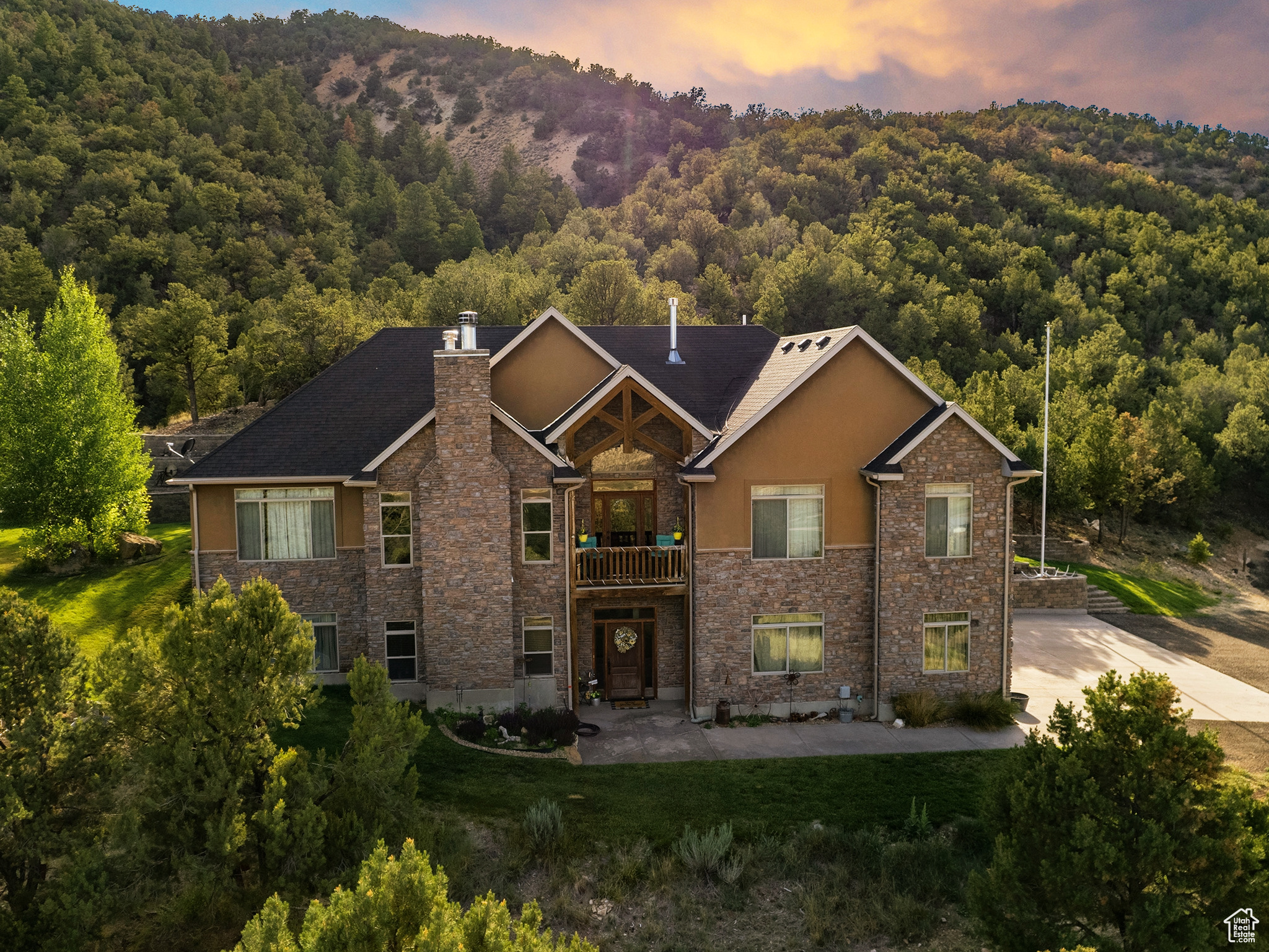 **Discover mountain living at its finest in this spacious home overlooking the scenic Currant Creek River Valley**. Surrounded by multiple lakes and nestled in nature, this property offers ultimate peace and privacy, yet remains easily accessible via a paved, county-maintained road that leads directly to the driveway. Set on over 10 acres, there's plenty of room to roam, so bring all your outdoor toys to enjoy! Whether it's boating, fishing, ATV riding, or snowmobiling, this property is your basecamp for adventure in every season. The oversized, heated garage and heated sidewalks add year-round comfort and convenience. Inside, enjoy the quiet efficiency of in-floor radiant heat, with individual temperature controls in each room for personalized comfort throughout the home. Whether you're looking for a serene primary residence or a luxurious vacation escape, this property offers the best of both worlds. *Square footage figures are provided as a courtesy estimate only and were obtained from Building Plans on file.  Buyer is advised to obtain an independent measurement and to verify all info.