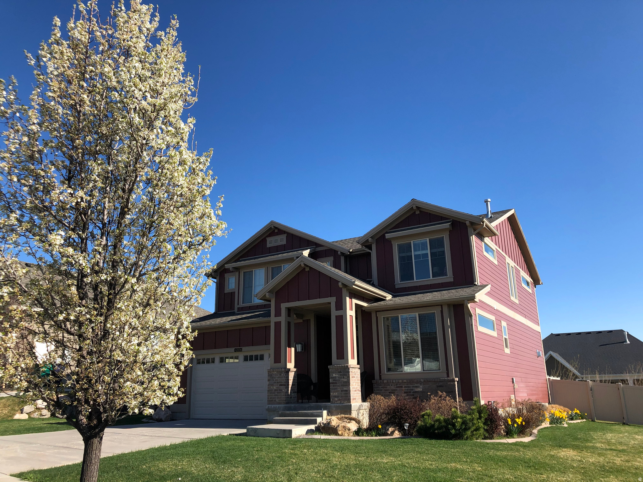 Welcome home to this beautiful Utah sanctuary in a cul-de-sac in the Wasatch Mountain foothills. This property is in a welcoming neighborhood 10 minutes from local shopping, dining, and Hill Air Force Base. Step inside to a thoughtful layout featuring six bedrooms and designed for gathering, boasting an oversized pantry, dining room and two cozy gas fireplaces. Downstairs, a fully finished basement is perfect as a recreation room, home theater, or home gym.  Fall in love with the expansive tandem three-car garage with overhead storage, providing abundant space for vehicles, a workshop, or storing your outdoor gear. Step onto your spacious back deck and take in the breathtaking views of both the Wasatch Mountains and the Great Salt Lake. It is the perfect backdrop for morning coffee, evening entertaining, and world-class Utah sunsets. Don't miss the opportunity to own this spacious, view-swept home in one of Layton's most desirable locations!
