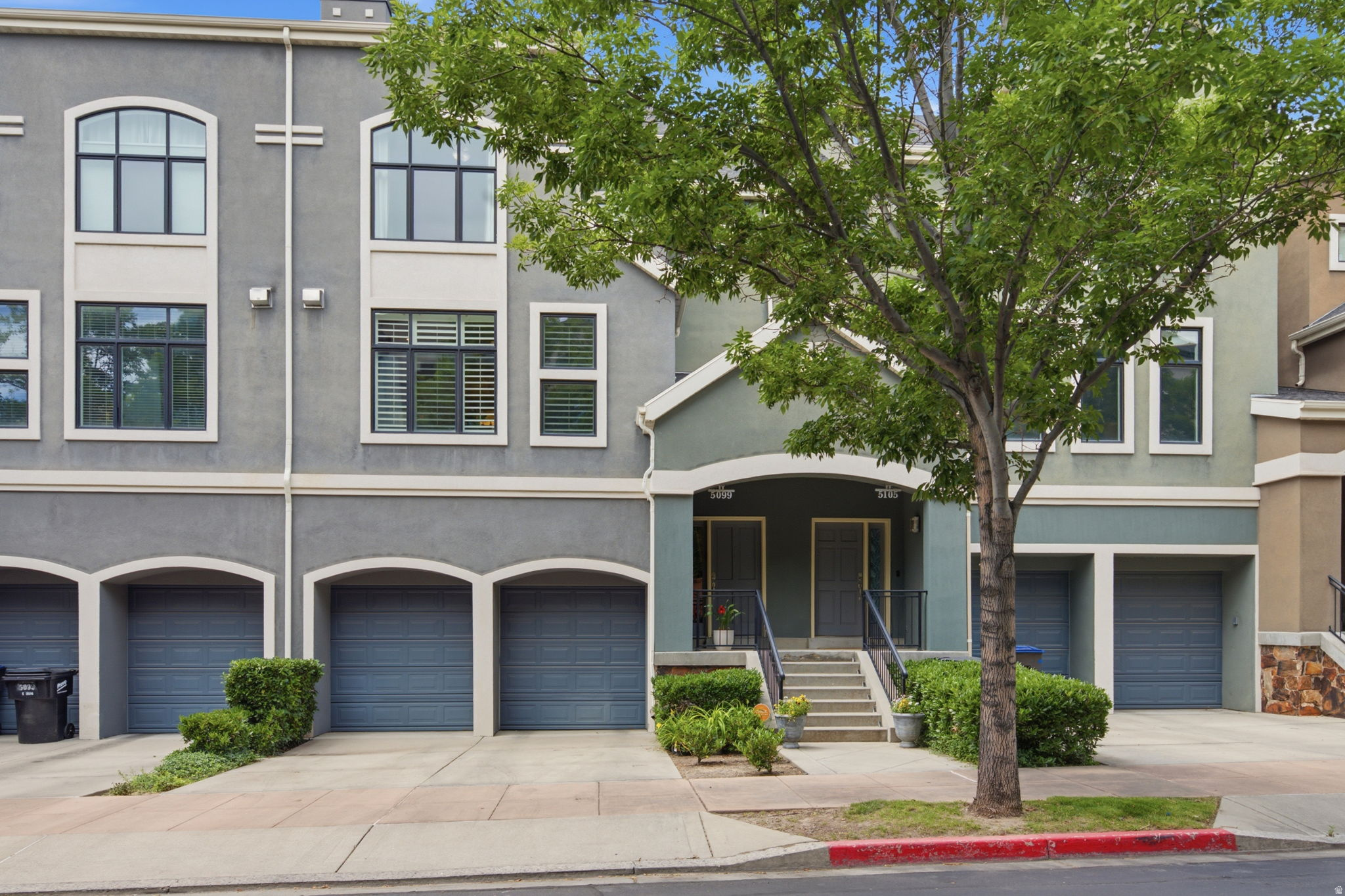 Luxury Living in the highly sought-after Village at Riverwoods! This beautifully maintained townhome is ideally located in Provo's desirable River Bottoms, backing to the scenic Provo River w/easy access to parks, trails, shopping, dining and entertainment.  The Balcony is a perfect spot to enjoy the sound of the river and take in the beautiful Mature Trees w/meandering path! Inside you'll find exceptional finishes throughout, including rich walnut flooring, quartz countertops in the kitchen and bathrooms, stunning fireplace and spacious walk-in closets with custom built-ins.  The Primary Suite features double vanities and a relaxing tub.  There is also another bedroom w/on suite bathroom. Enjoy the convenience of a large 2 car garage and an  expansive basement providing abundant storage space.  An exceptional opportunity to enjoy low-maintenance living in one of Provo's most desirable locations.