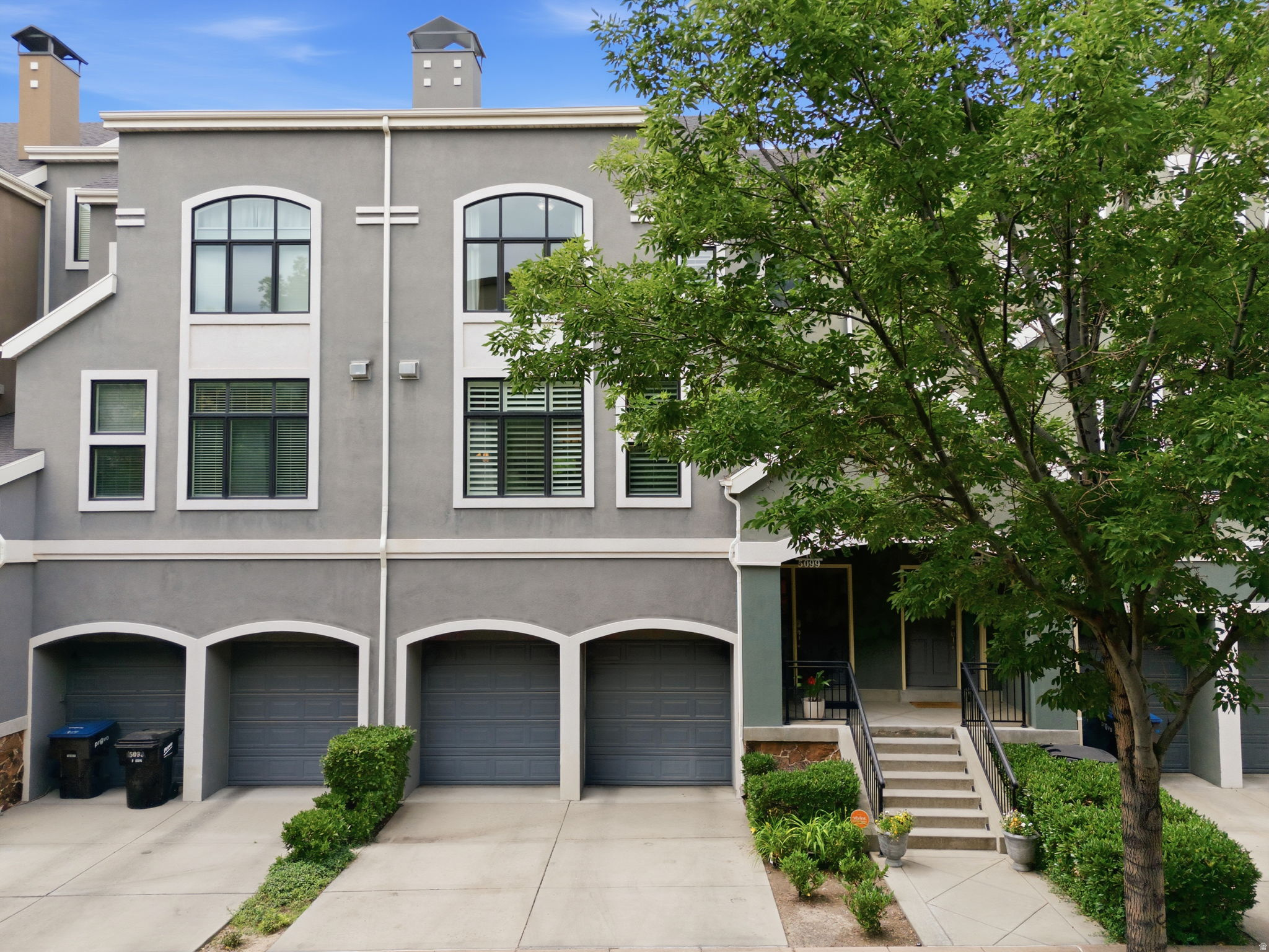 Luxury Living in the highly sought-after Village at Riverwoods! This beautifully maintained townhome is ideally located in Provo's desirable River Bottoms, backing to the scenic Provo River w/easy access to parks, trails, shopping, dining and entertainment.  The Balcony is a perfect spot to enjoy the sound of the river and take in the beautiful Mature Trees w/meandering path! Inside you'll find exceptional finishes throughout, including rich walnut flooring, quartz countertops in the kitchen and bathrooms, stunning fireplace and spacious walk-in closets with custom built-ins.  The Primary Suite features double vanities and a relaxing tub.  There is also another bedroom w/on suite bathroom. Enjoy the convenience of a large 2 car garage and an  expansive basement providing abundant storage space.  An exceptional opportunity to enjoy low-maintenance living in one of Provo's most desirable locations.