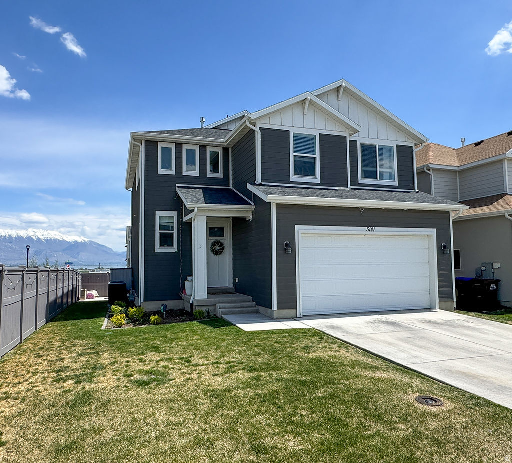 **MOTIVATED SELLERS** This beautifully maintained two-story home offers the perfect blend of modern style, comfort, and community living. Featuring an open-concept floor plan with tons of natural light, the main living space flows seamlessly into a bright kitchen complete with white cabinetry, stainless steel appliances, large island with seating, and quartz countertops. The spacious layout is ideal for both everyday living and entertaining. Outside, you'll enjoy great curb appeal with modern exterior colors, plenty of grass and patio area, and amazing views of the mountains, lake, and Saratoga Springs LDS Temple. Enjoy access to incredible community amenities including a large clubhouse, community gym, and resort-style pool perfect for relaxing all summer long. Conveniently located near parks, schools, shopping, and hiking trails, this home offers both comfort and convenience in a highly desirable neighborhood for a family of any size!  Square footage figures are provided as a courtesy estimate only and were obtained from County Records. Buyer is advised to obtain an independent measurement.