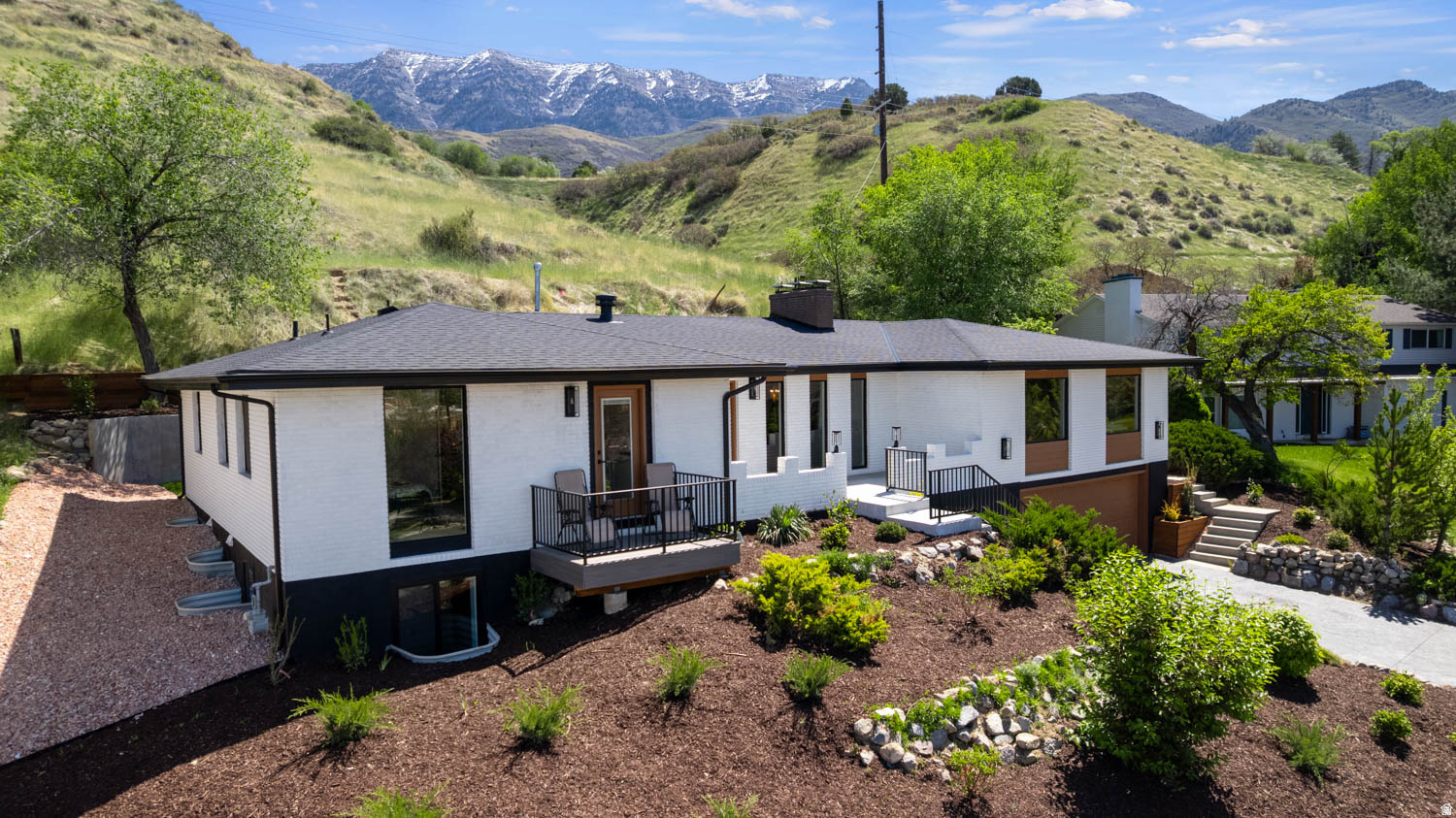 OPEN HOUSE SATURDAY 10am-12pm. Searching for your own new-build sanctuary on Provo's East Bench? Nestled near the end of a cozy cul-de-sac, you'll find it hard to believe you're just minutes from Provo Canyon, Sundance Resort, Days Market, top-notch schools, including Slope School, and BYU, when you step into this fully renovated (down to the studs) residence. Entertain with ease in the chef's kitchen, complete with a 48" Sub-Zero fridge, 36" gas range, wall oven, built-in microwave, and a gorgeous waterfall edge island (granite, of course). Granite countertops also border the butler's pantry, where custom solid-wood cabinetry lines the walls to offer storage solutions for any clutter you'd prefer your dinner guests remain oblivious to. The custom cabinetry extends throughout the home, where everything is new aside from the original brick. For a house that received the upgrade of a lifetime (so much so that its effective build date is 2026), the warmth it radiates will make you feel like you've already lived here for years. Speaking of warmth, the home includes three gas fireplaces for the cooler months, and a sunroom surrounded by floor-to-ceiling folding glass doors for when you want to blur the lines between inside and out. Stepping out through those doors, your feet will land on new landscaping, complete with fully automatic drip-irrigation and sprinklers. The views speak for themselves. Whether you prefer to take them in from the living room, lounge on the private deck, or relax out back, the privacy you'll feel is unrivaled in a location that also boasts accessibility. There's even a view from the basement! When the light fades and you tire of that view, walk across the basement to the wet bar or refrigerator to grab yourself a drink before settling in for the night in your (could be!) theatre room. With solid oak floating stairs leading upstairs, and a spacious garage at the south end of the basement, this home is prepared for wherever your night takes you. *Garage is large enough to house two full-size SUVs in addition to a pair of side-by-sides. **Other popular nearby destinations include: Timpview High School, Canyon Crest Elementary, the Riverwoods, and Sundance. *** Square footage figures are provided as a courtesy estimate only and were obtained from the builder's estimate. Buyer is advised to obtain an independent measurement.