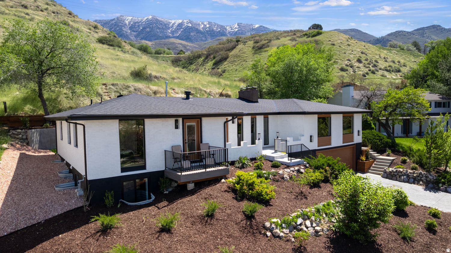 Searching for your own new-build sanctuary on Provo's East Bench? Nestled near the end of a cozy cul-de-sac, you'll find it hard to believe you're just minutes from Provo Canyon, Sundance Resort, Days Market, top-notch schools, including Slope School, and BYU, when you step into this fully renovated (down to the studs) residence. Entertain with ease in the chef's kitchen, complete with a 48" Sub-Zero fridge, 36" gas range, wall oven, built-in microwave, and a gorgeous waterfall edge island (granite, of course). Granite countertops also border the butler's pantry, where custom solid-wood cabinetry lines the walls to offer storage solutions for any clutter you'd prefer your dinner guests remain oblivious to. The custom cabinetry extends throughout the home, where everything is new aside from the original brick. For a house that received the upgrade of a lifetime (so much so that its effective build date is 2026), the warmth it radiates will make you feel like you've already lived here for years. Speaking of warmth, the home includes three gas fireplaces for the cooler months, and a sunroom surrounded by floor-to-ceiling folding glass doors for when you want to blur the lines between inside and out. Stepping out through those doors, your feet will land on new landscaping, complete with fully automatic drip-irrigation and sprinklers. The views speak for themselves. Whether you prefer to take them in from the living room, lounge on the private deck, or relax out back, the privacy you'll feel is unrivaled in a location that also boasts accessibility. There's even a view from the basement! When the light fades and you tire of that view, walk across the basement to the wet bar or refrigerator to grab yourself a drink before settling in for the night in your (could be!) theatre room. With solid oak floating stairs leading upstairs, and a spacious garage at the south end of the basement, this home is prepared for wherever your night takes you. *Garage is large enough to house two full-size SUVs in addition to a pair of side-by-sides. **Other popular nearby destinations include: Timpview High School, Canyon Crest Elementary, the Riverwoods, and Sundance. *** Square footage figures are provided as a courtesy estimate only and were obtained from the builder's estimate. Buyer is advised to obtain an independent measurement.