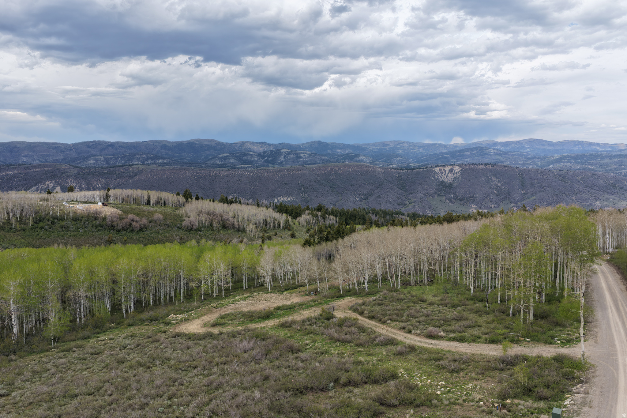 Pristine Quaking Aspens Mountain Views. This 9-acre lot slopes into flat pad and land area  then a slight slope to lower flat at the base. Highlights completed with this Lot D63 include  Installed 200-foot 12ft wide  winding gravel driveway to pad  Water connected to freezeless hydrant for year round use  Firepit installed  Perc Test approved  3  inch power conduit line installed and run to pad. Lot D63 is ready for your retreat this year. Drive up and walk around the Lot. Boundaries are tagged with Orange tape for your preview. Note: front lot boundaries are to center of gravel road. Buyers are to verify all lot boundaries and information provided on land and MLS sites. Winter access with plowed roads. Activities are  Show up to lot often and disappear from city life, ATV ventures, boating and fishing on Scofield reservoir 20 minutes away, hunting lands, snowmobiling.