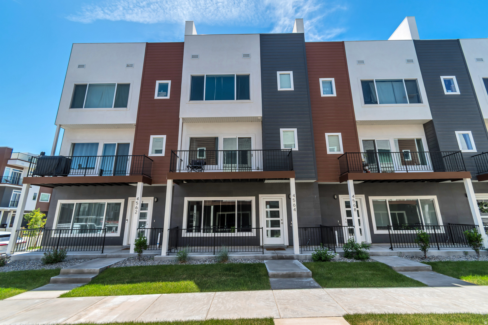 Welcome to this townhouse that redefines what modern townhouse living can be. With four bedrooms and four bathrooms-2 full and 2 half, this home delivers generous space, thoughtful design, and an unbeatable price point that makes elevated living genuinely attainable. From the moment you step inside, the quality of construction speaks for itself. Clean lines, durable finishes, and well-crafted details create an environment that feels both refined and built to last. Every level of this townhouse has been designed with intention, balancing everyday functionality with modern sophistication. What truly sets this home apart is its exceptional outdoor living. A ROOFTOP  terrace deck offers sweeping views and the perfect venue for entertaining under Utah's legendary skies. The second-floor deck and patio provide additional retreats where you can unwind, host friends, or simply enjoy a quiet morning coffee.  ALL FURNITURES IN THE HOUSE ARE INCLUDED WITH THE SALE.   Location adds even more value to this already compelling package. Daily conveniences are well within reach, with grocery stores just minutes away and the 3500 S / 4800 W bus stop nearby for easy commuting.  For buyers seeking a well-built townhouse that delivers premium features without the premium price tag, this property checks every box. Homes like this attract serious interest quickly, so schedule your private showing before this opportunity passes you by.