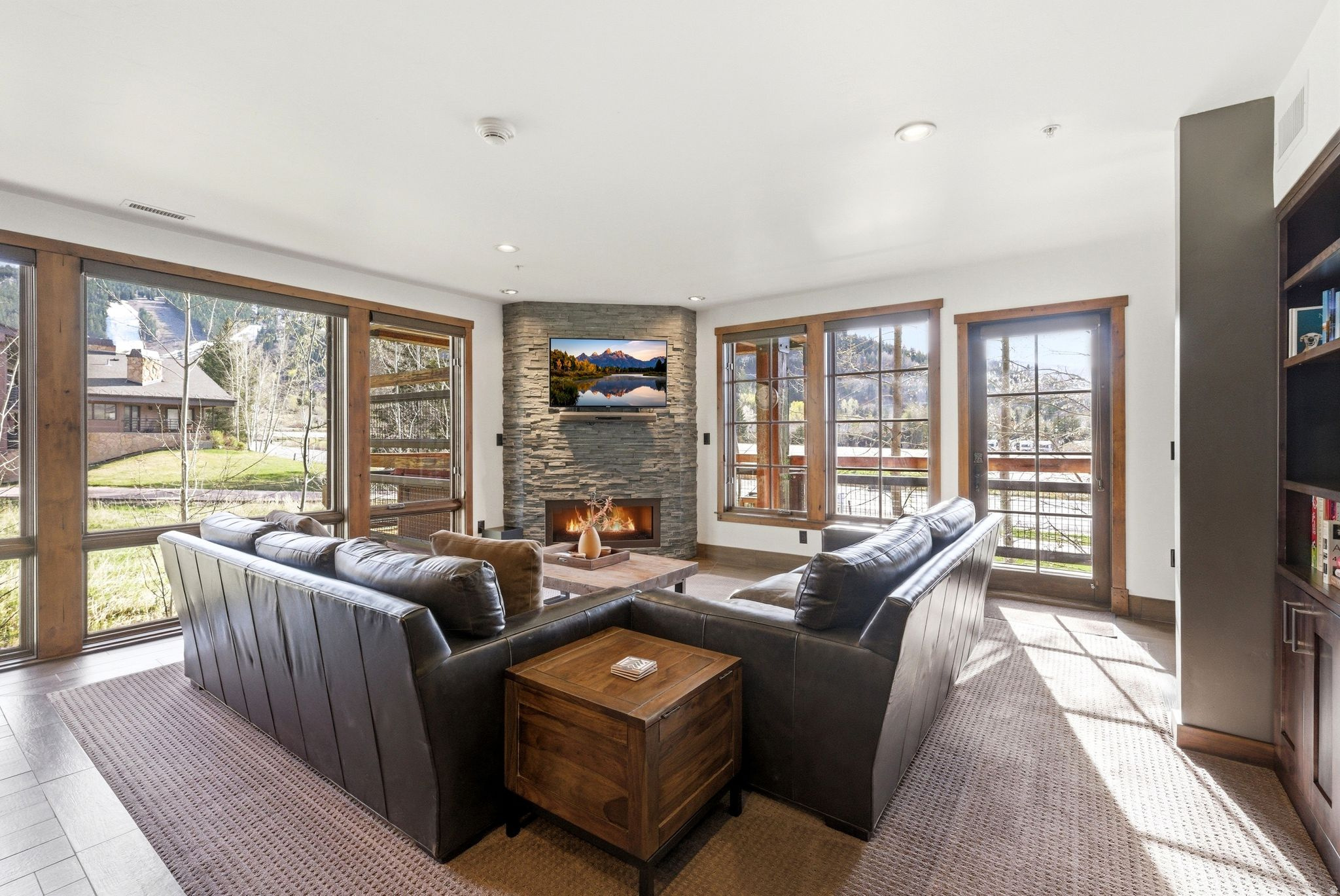 Chic, Well Designed Silver Baron End Unit with Big Ski Resort Views.  A timeless contemporary renovation to this amazing end unit in the heart of Deer Valley. The property has large picture windows on two sides of the living space taking in huge views of both the slopes of Deer Valley and Park City Mountain. The great room offers a large living area, open kitchen and beautiful fireplace all perfectly situated for entertaining or staying at home after a fun day in the mountains. There's an over-sized deck with a hot tub. Plus, both bedrooms offer private bathrooms, large closets and are separate from each other for great privacy. The third bathroom has a shower/tub for any over-flow guests sleeping on the sofa-sleeper in the living room. There's plenty of storage and a laundry room. A wonderful ski property and rental.