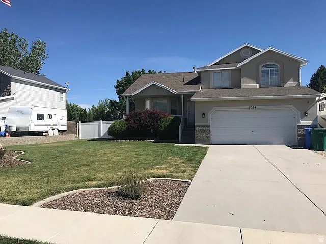 This beautifully maintained Riverton home features vaulted ceilings that create a bright, open, and inviting living space. Enjoy the beautifully landscaped, fully fenced backyard-perfect for BBQs, entertaining, or relaxing with family and friends. Extended RV parking offers plenty of room for your RV, trailer, or additional vehicles. Conveniently located with quick access to Mountain View Corridor for an easy commute and just minutes from shopping, dining, parks, and everyday amenities. This home combines comfort, convenience, and outdoor living in a fantastic location. Don't miss your chance to make it yours! No showings for now. But, seller is accepting offers.